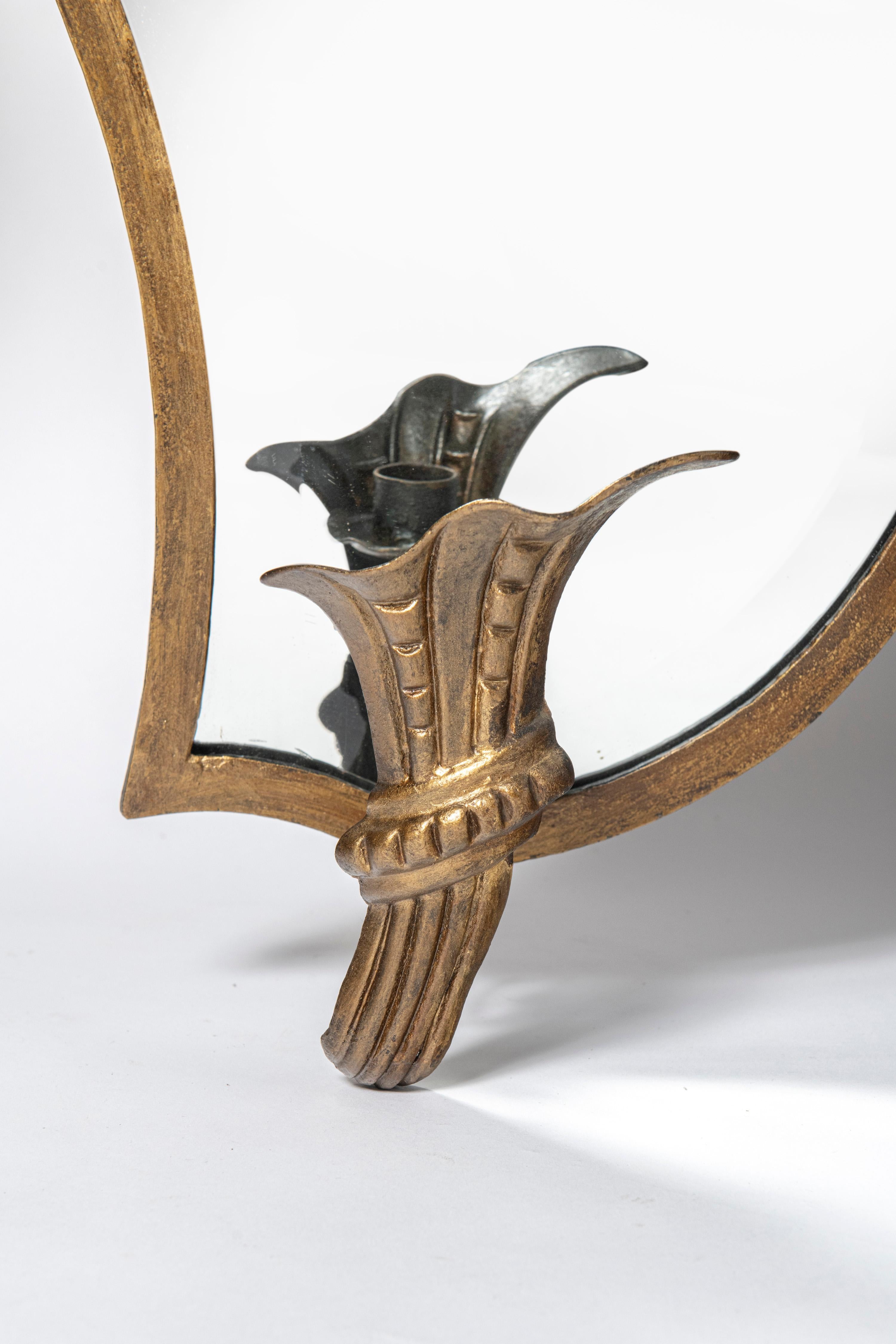 Bronze mirror-candle wall sconces attributed to Maison Jansen. Argentina, circa 1950.