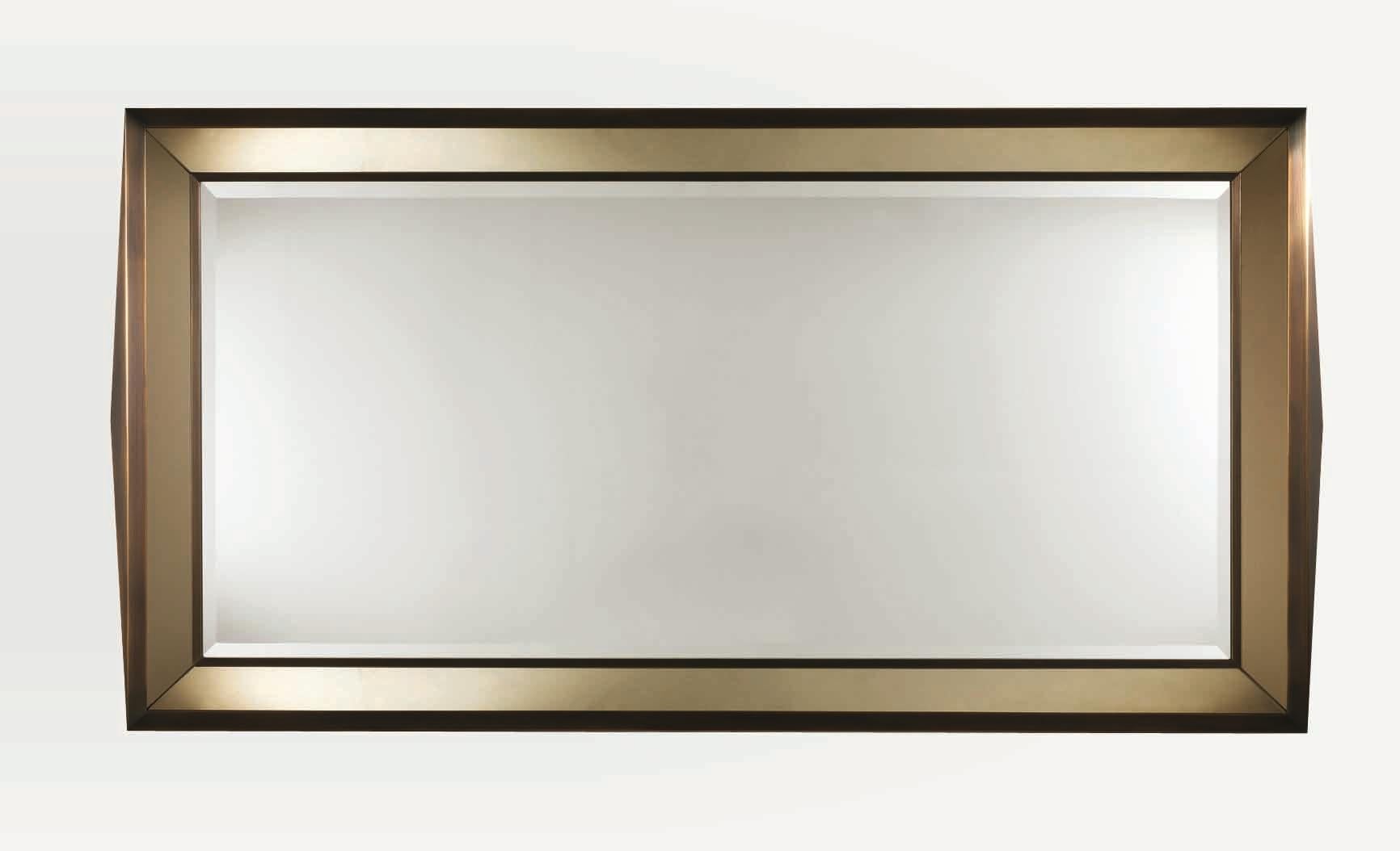 Bronze frame with side diamond shape and outer edges of mirror in bronzed mirror.