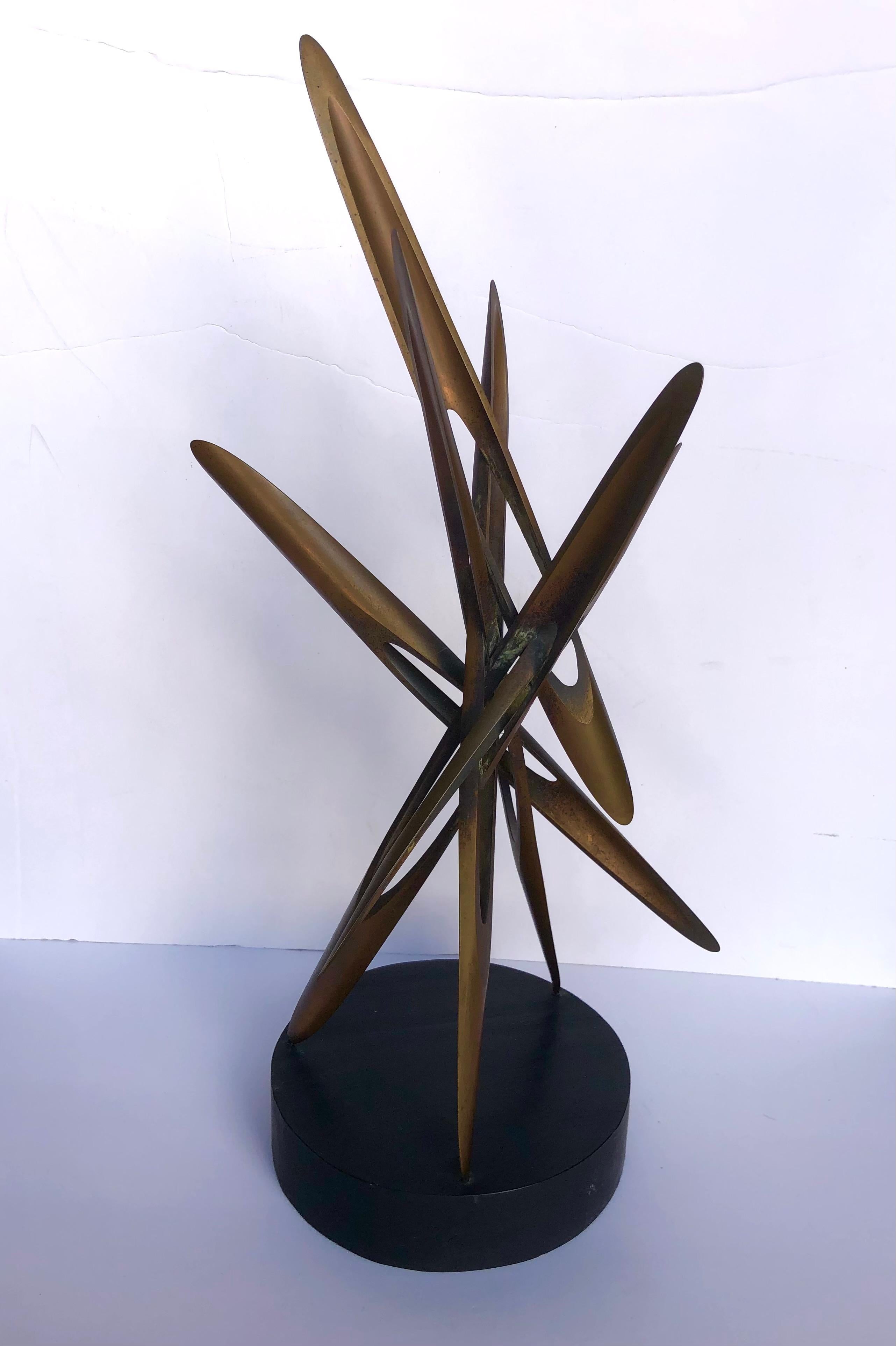 c. 1960s, American, high quality cast and welded bronze, mounted on round black wood base, unsigned.