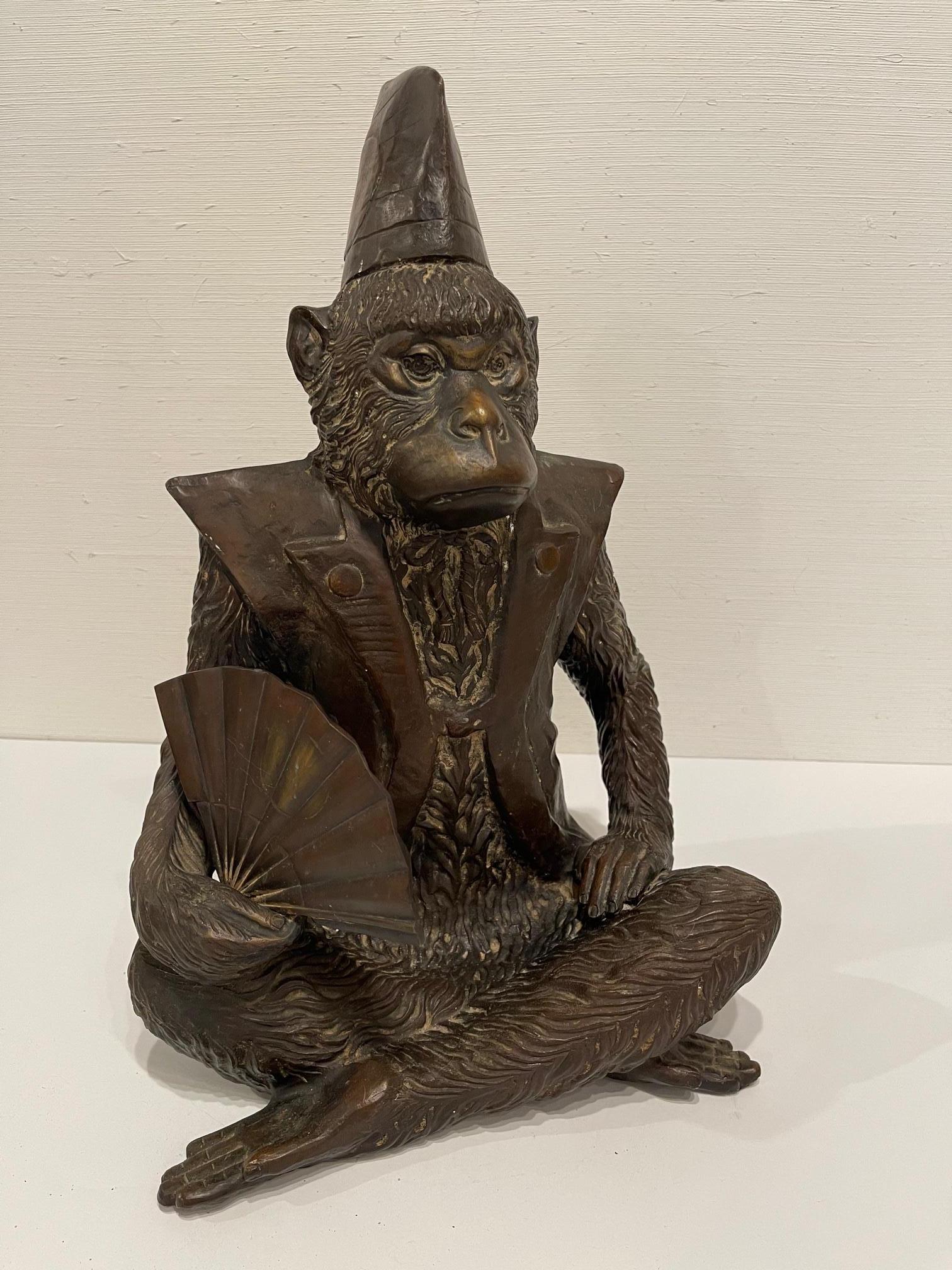 Bronze monkey Emperor holding a fan, 20th century. Originally purchased at Gumps.
 