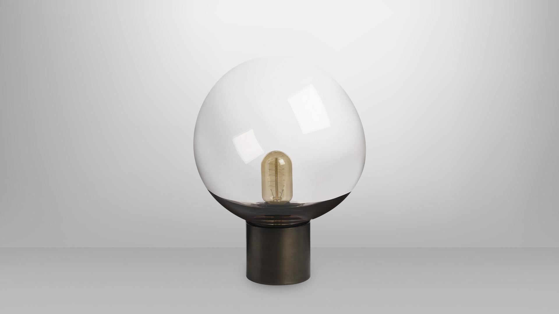 Moon table lamp by CTO Lighting
Materials: Bronze base with hand-blown bronze tinted glass shade and opal diffuser
Dimensions: 24 x H 33 cm

All our lamps can be wired according to each country. If sold to the USA it will be wired for the USA