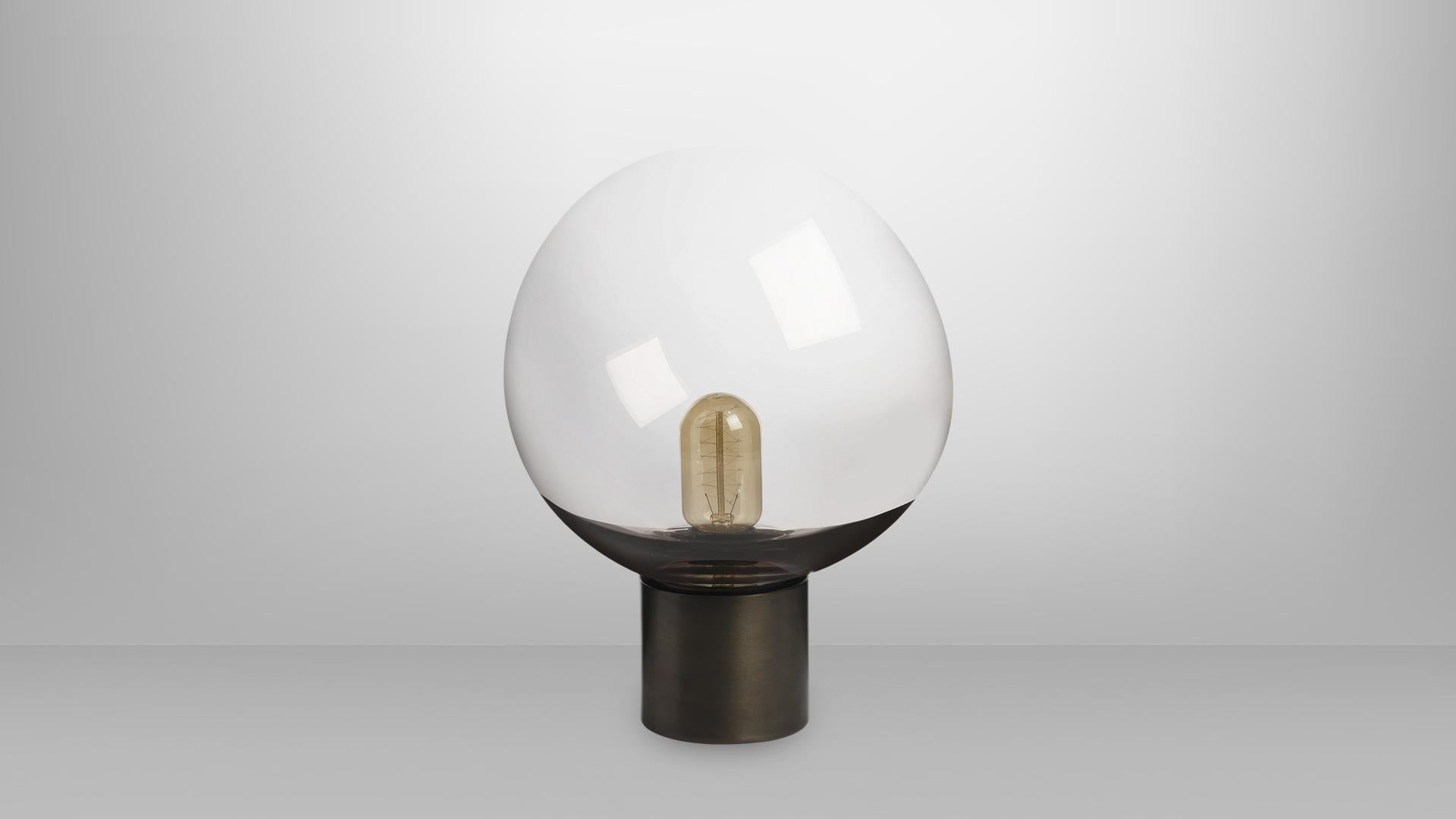 Moon table lamp by CTO Lighting
Materials: Bronze base with hand-blown bronze tinted glass shade and opal diffuser
Dimensions: 24 x H 33 cm

All our lamps can be wired according to each country. If sold to the USA it will be wired for the USA for