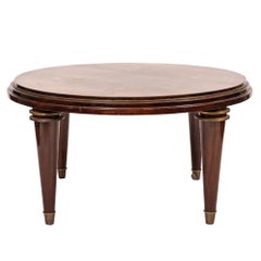 Mesa baja circular montada en bronce, de Jules Leleu