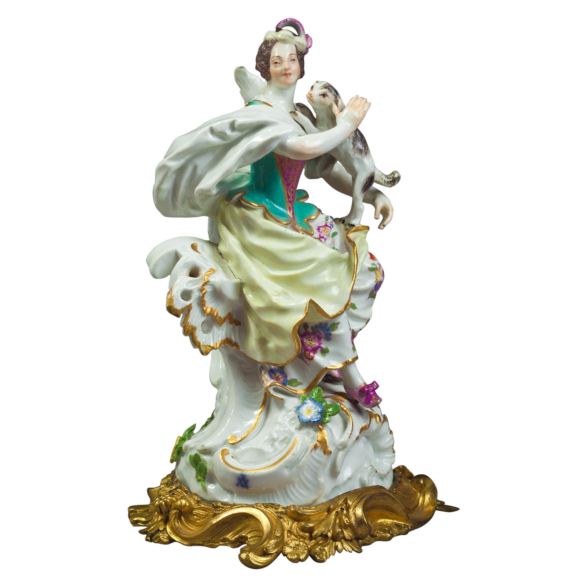 Bronze Mounted German Porcelain Figure of a Lady with Dog, Meissen, circa 1750