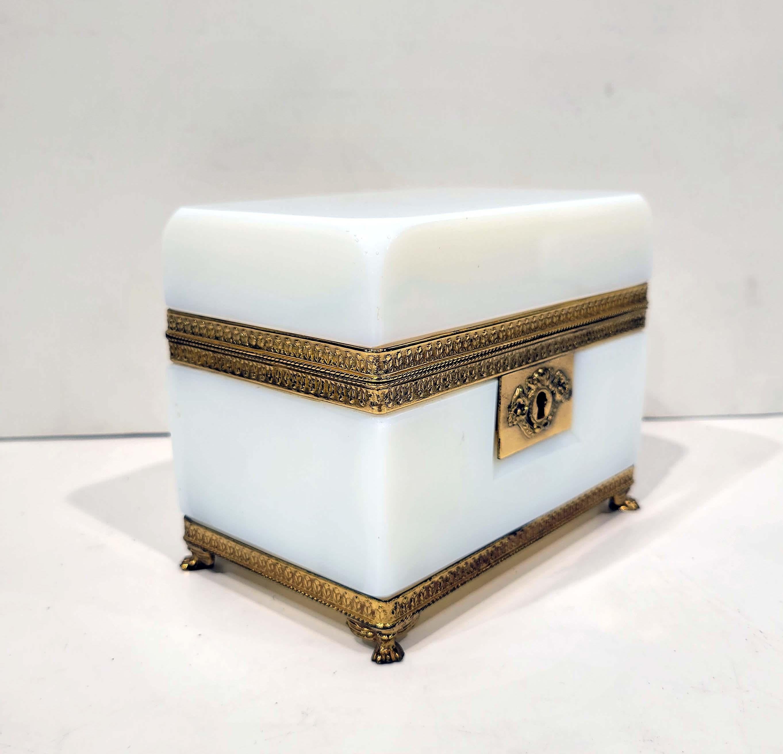 A beautiful bronze mounted white opaline jewelry box in empire style, French Circa 1900.
 