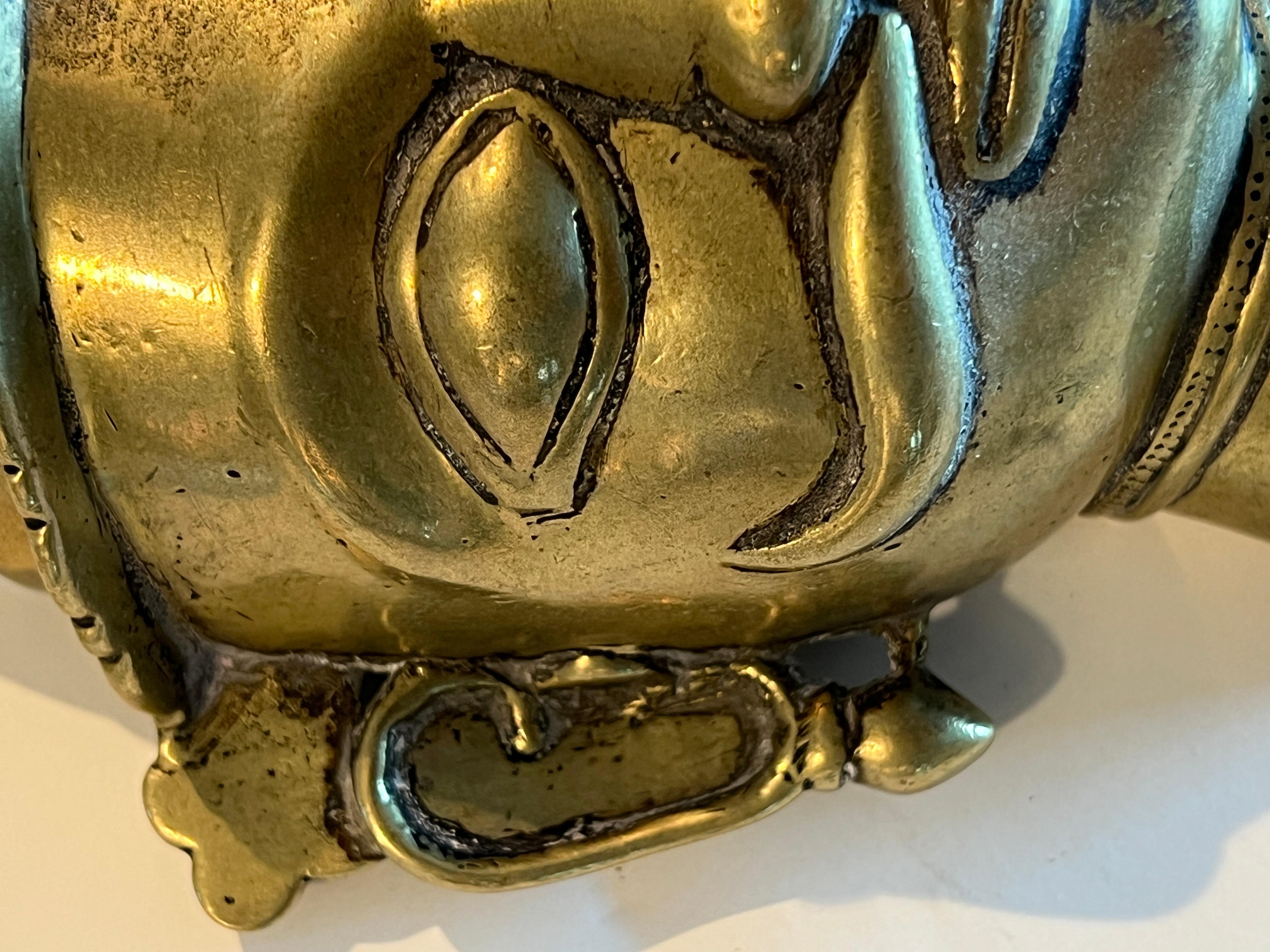 Tribale Mukhalingam in bronzo a forma di testa, India, XVIII-XIX secolo in vendita