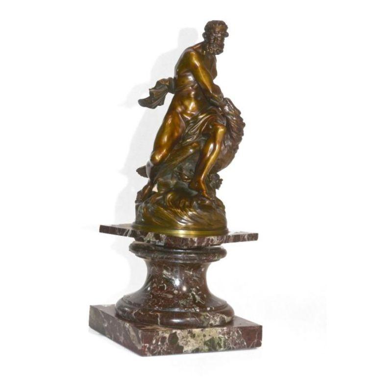 Sujets mythologiques en bronze homme soulevant un aigle monté sur une base tournante patine marbre rouge médaille en bronze dimension 25 cm de haut hauteur de la base 14 cm pour une hauteur totale de 41 cm.

Informations complémentaires