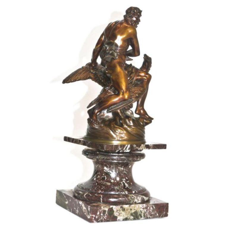 Patinated Bronze Mythological Subjects Man Raising an Eagle Xixth For Sale