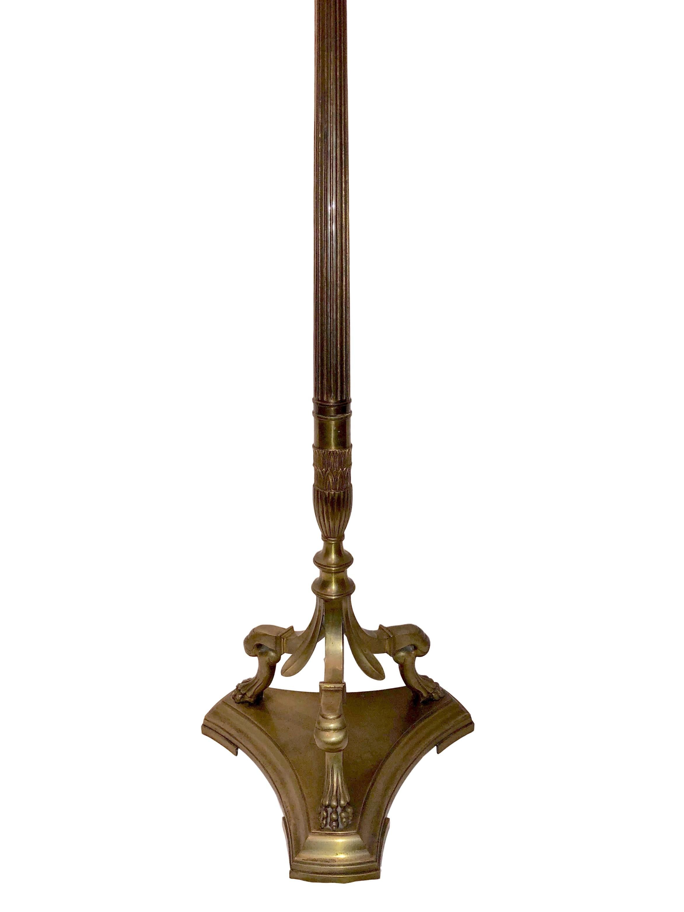 A circa 1920s French bronze floor lamp of neoclassic motif.

Measurements:
Height 65?
Diameter of base 14