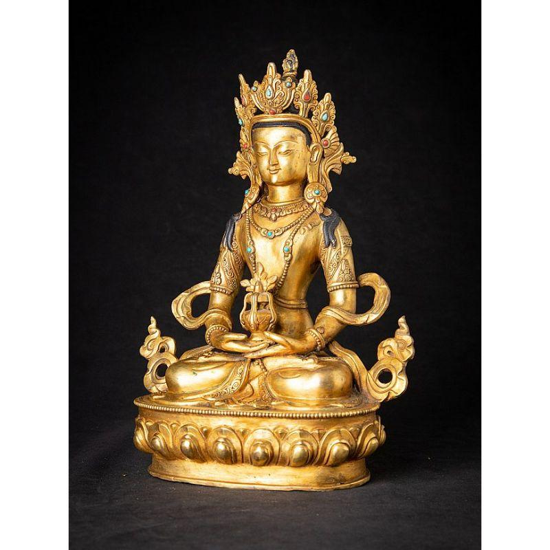 Material: bronze
31,7 cm high 
23 cm wide and 13,2 cm deep
Weight: 2.978 kgs
Fire gilded with 24 krt. gold
Dhyana mudra
Originating from Nepal
Newly made in the highest quality !

