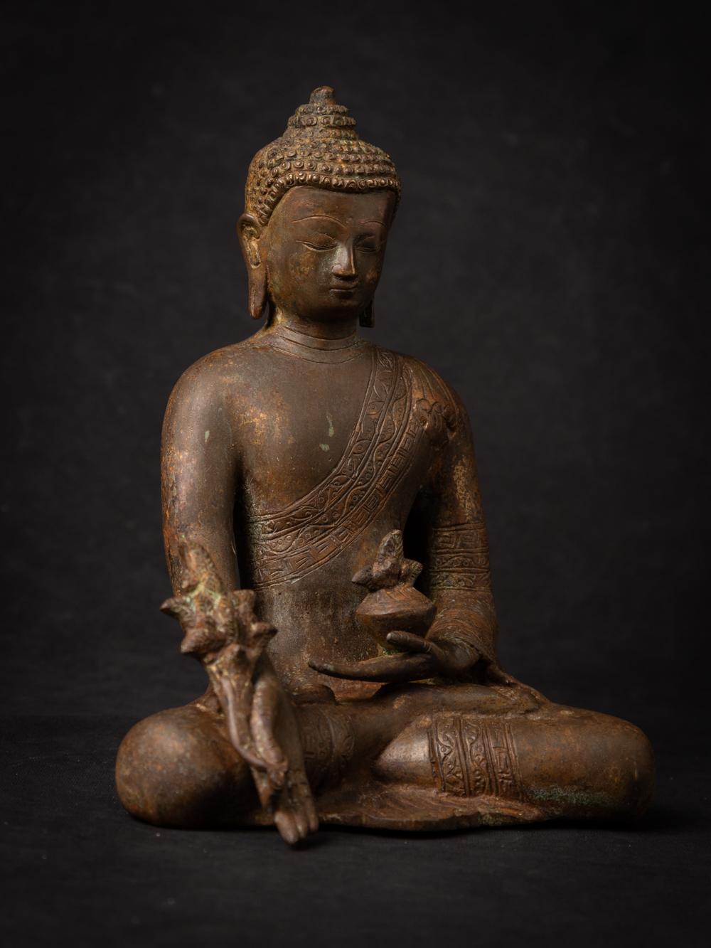 Bronze Nepali Medicine Buddha statue
Material : bronze
21,8 cm high
16,8 cm wide and 13 cm deep
Recently made - not antique
Weight: 2,74 kgs
Originating from Nepal
Nr: 3649-12

Nepali Medicine Buddha statue is very popular among all the Buddha