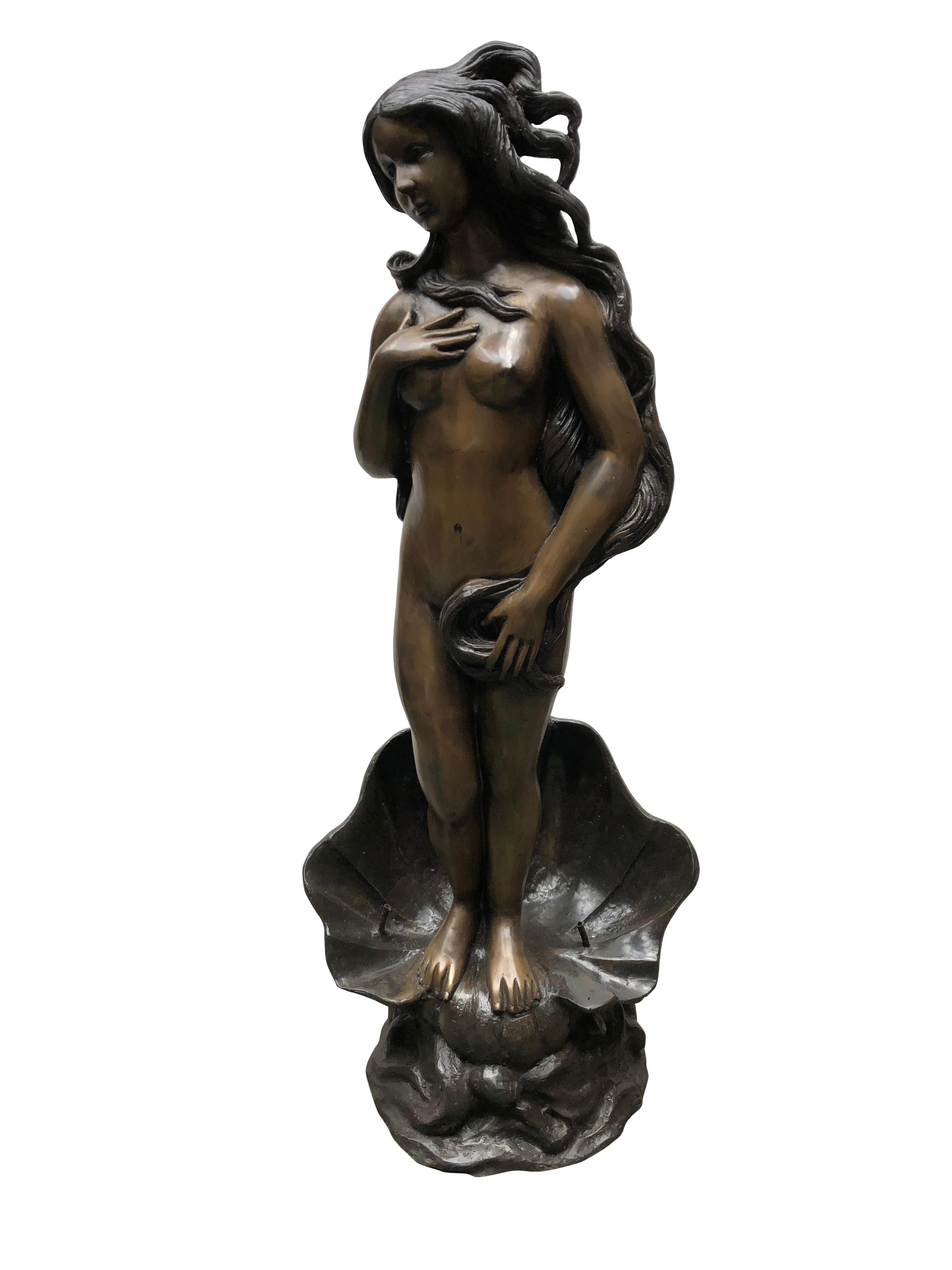 A gorgeous French Rococo bronze fountain in the form of a nude female. Stands at just under four feet tall so good size. Gorgeous female stands on the large conch shell at the base. You can see the two water outlets in the conch. Great patina to the