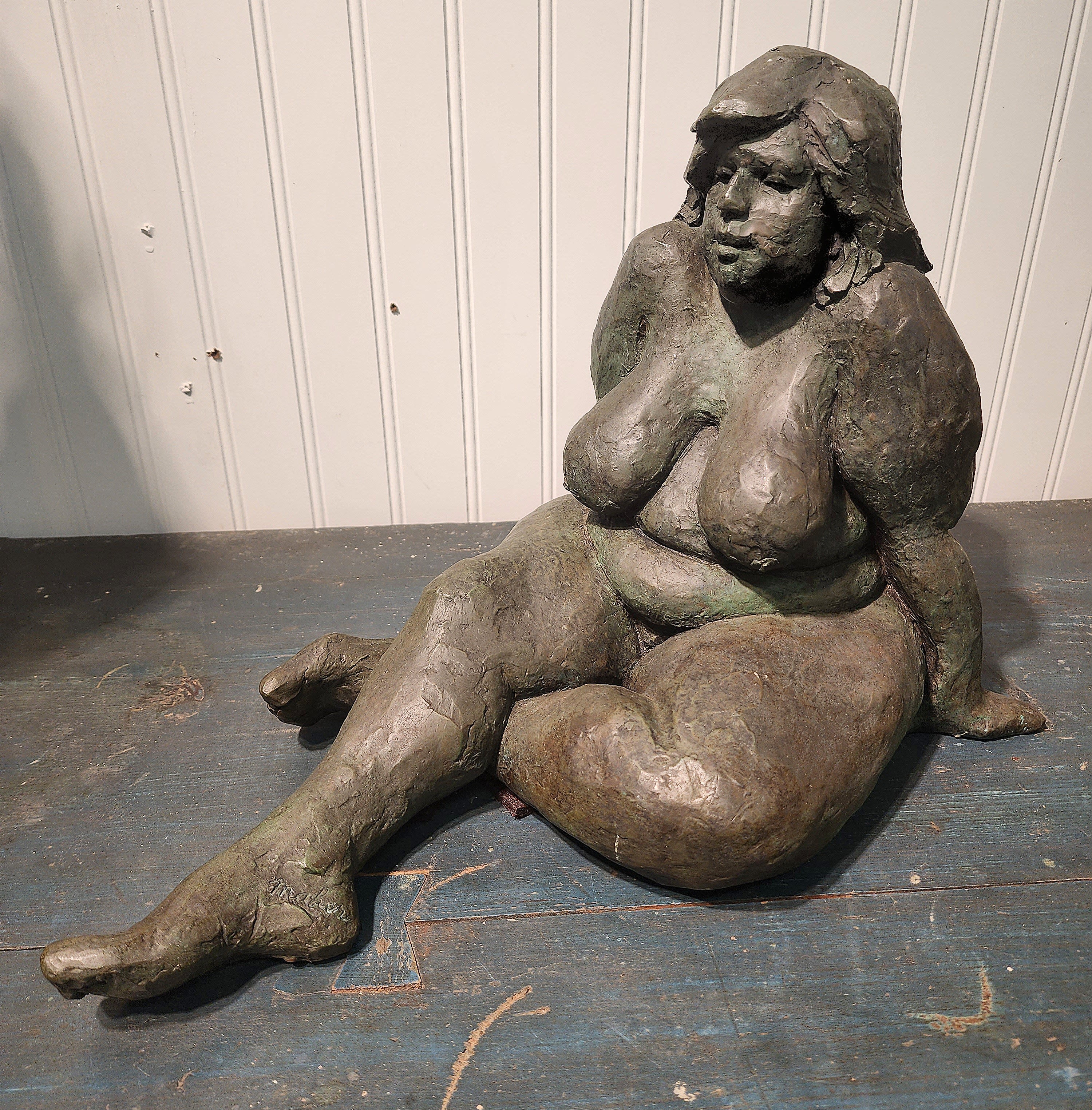 James Patrick Maher (20th Century), bronze Sculpture of a nude woman.
James P. Maher, was a renowned artist whose drawings, paintings and sculptures reflected an innate appreciation for the human form in all its beauty and imperfections.   His work