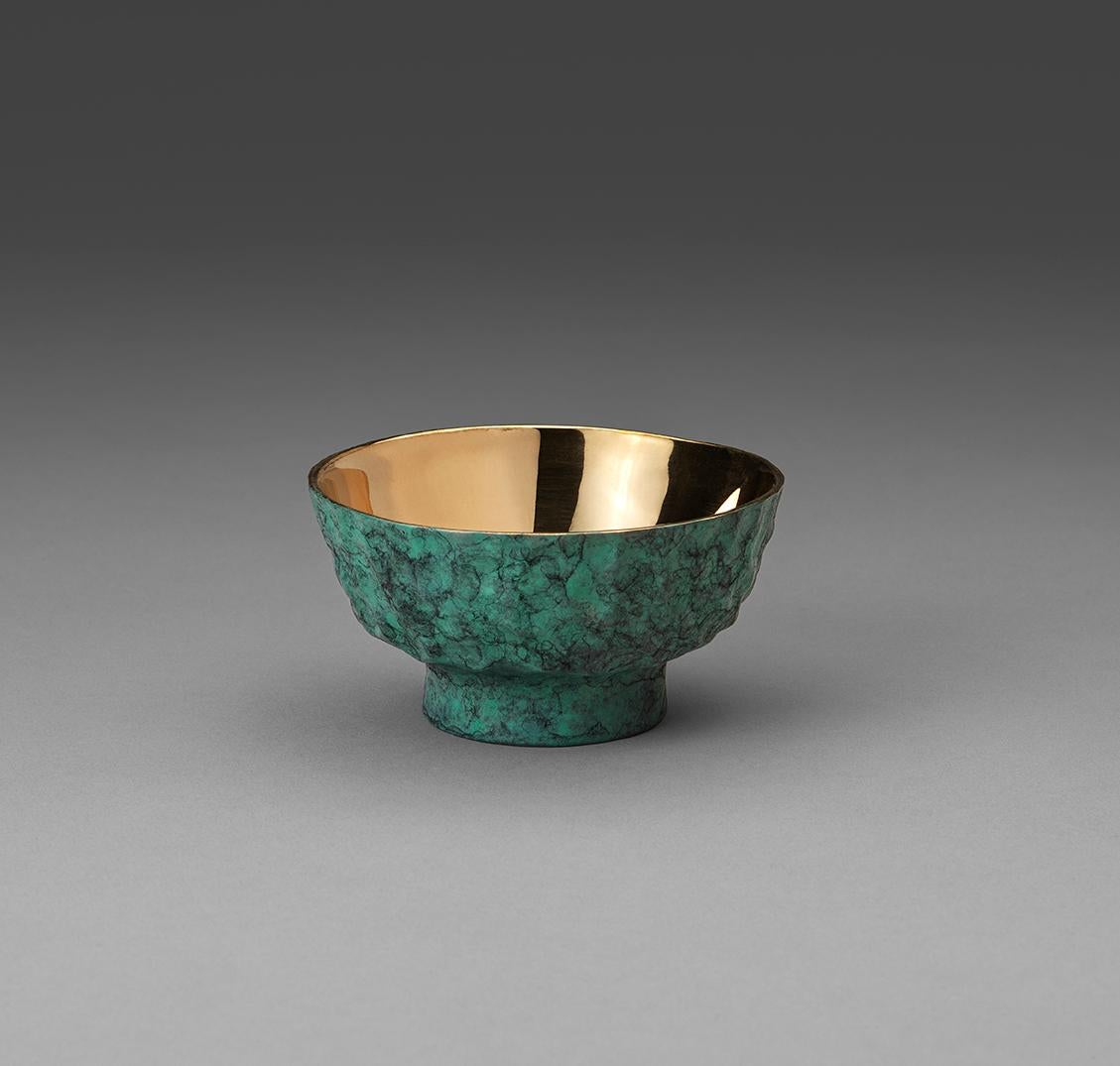 A bronze nut bowl with hand-wrought Verdigris patina. The interior of the bowl has been polished to a mirror finish and contrasts beautifully.