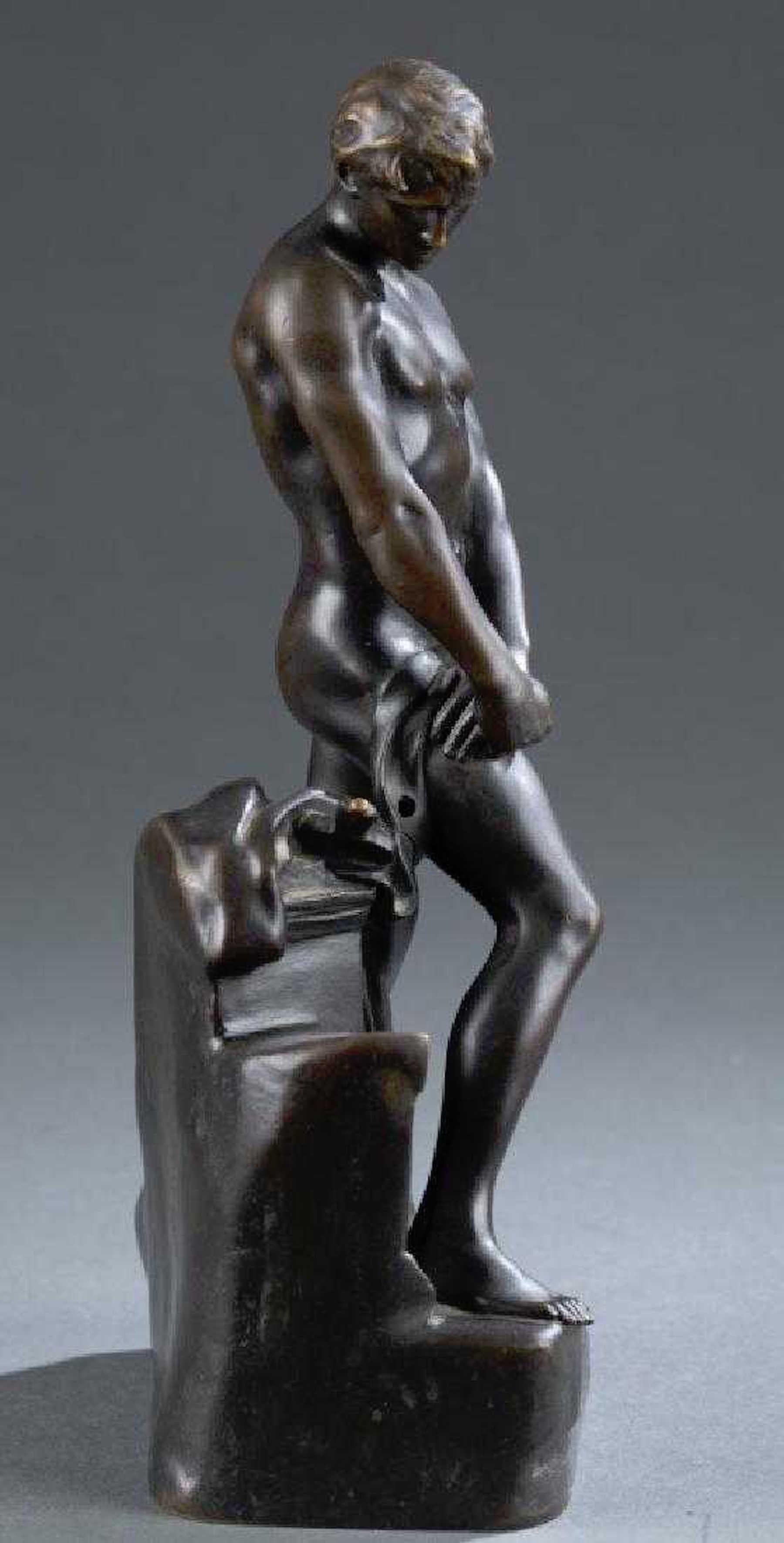 Bronze of a draped male nude athlete by Raoul Francois Larche (French, 1860-1912) 
Signed on base 