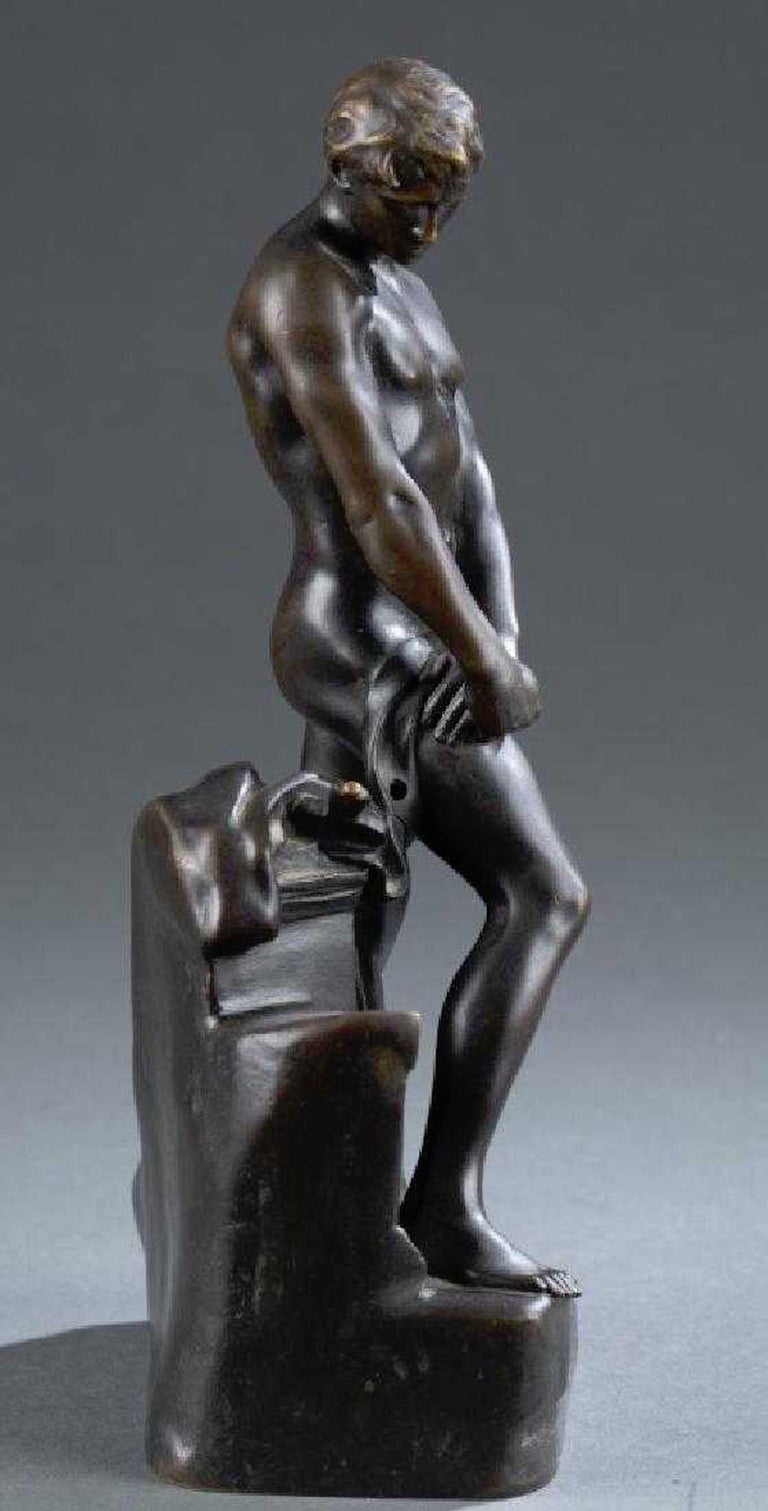 Bronze of a draped male nude athlete by Raoul Francois Larche (French, 1860-1912) 
Signed on base 
