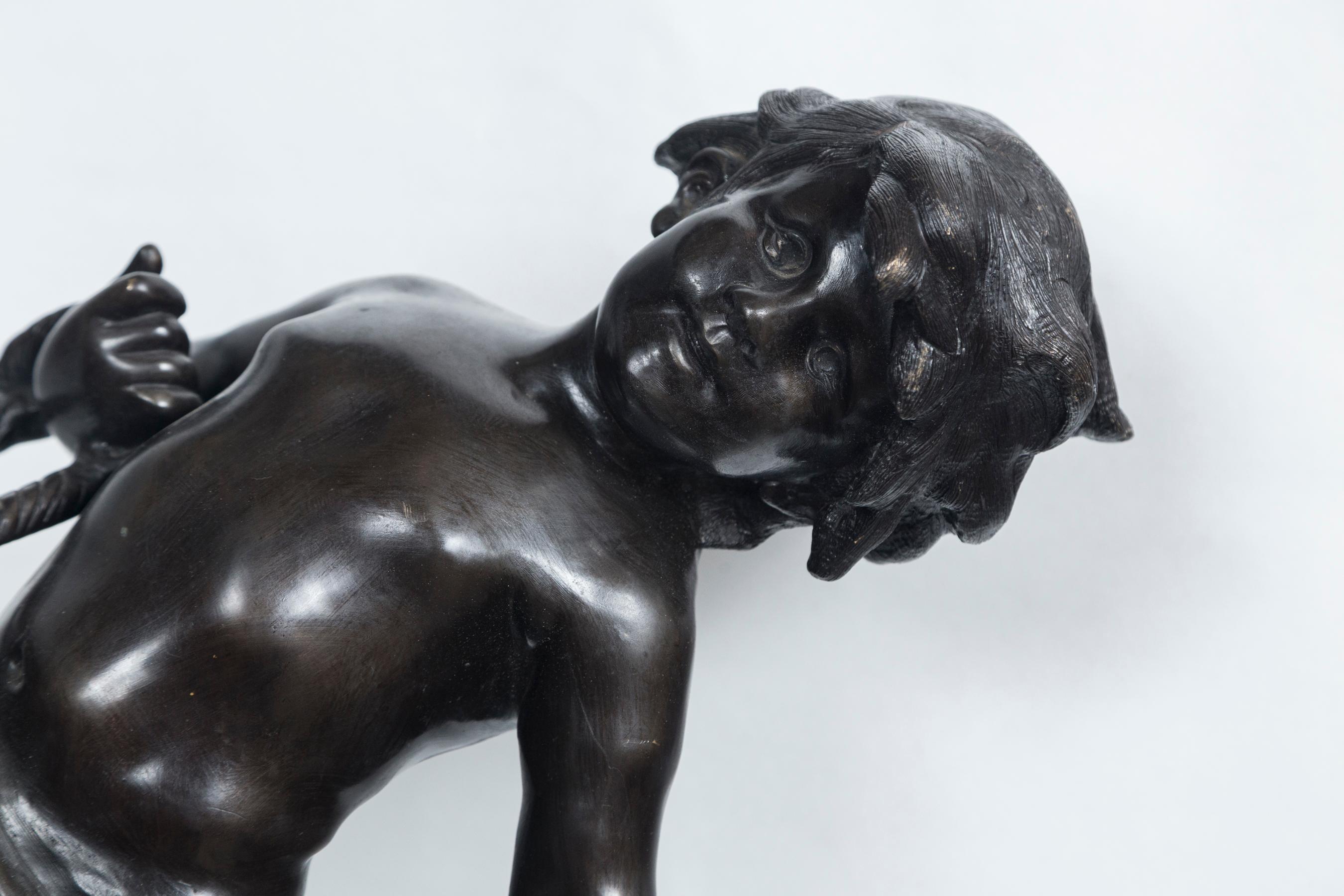 A well cast bronze, signed on the rocky base Auguste Moreau is a 20th century reproduction of one of Moreau's most famous works
The boy carries a leaking water jug suspended from a rope on his right forearm. He seems unaware it is leaking.
The