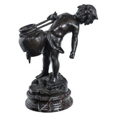 Bronze of a Partially Naked Boy with a Water Jug