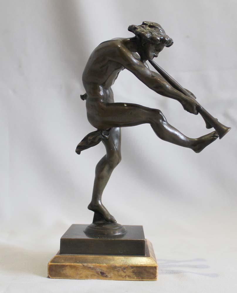French Bronze of a satyr playing pipes on Sienna marble base signed Bulio For Sale