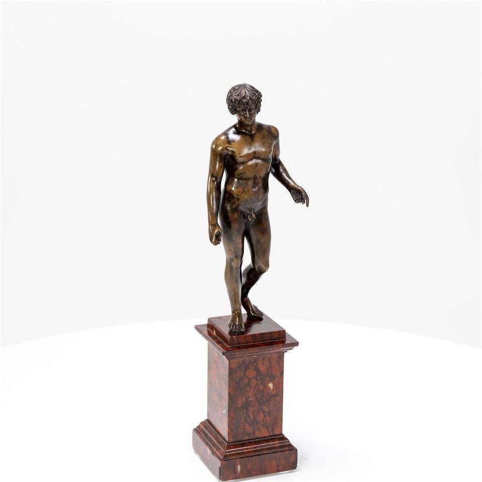 Bronze of Antinous Farnese standing on a red marbe griotte pedestal with beautiful, burnished patina.
 