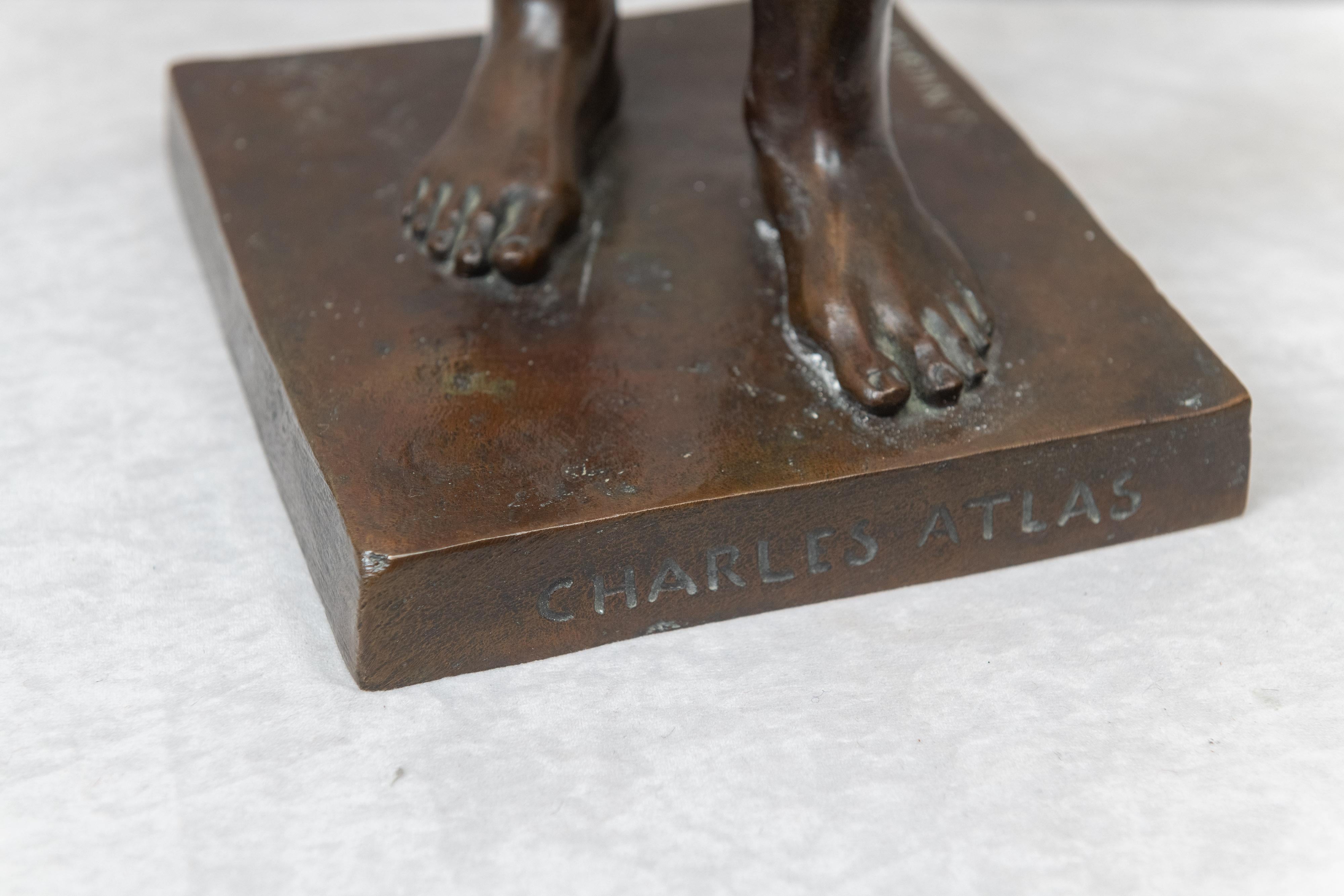  I recognized it was Charles Atlas before looking at the inscription on the front of the base bearing his name. Charles Atlas was such an iconic figure of my youth. We all wanted to look like him. He was handsome, and his body was godlike. He was