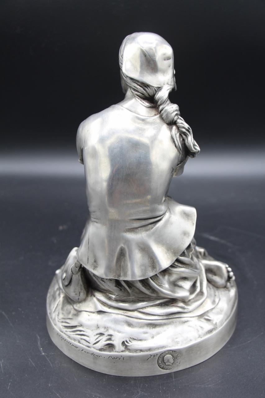 Joan of Arc at Domrémy listening to the Voices. Bronze with silver patina (rare) F. BARBEDIENNE Founder. Signed by Chapupastille of mechanical reduction by Collas. Based on the marble statue exhibited at the Salon of 1872 (no. 1595), at the
