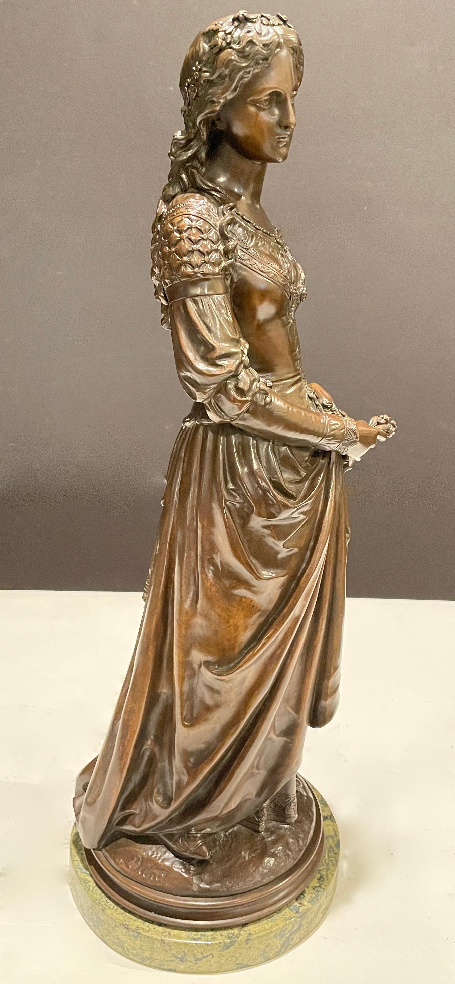 Cast 19th Century Sculpture Of  A Young Woman With Flowers By Marcel Debut For Sale