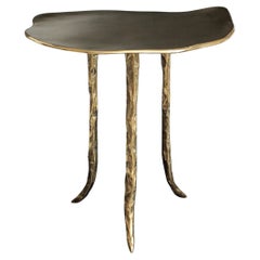 Mesa baja Onda de bronce by Studio Sunt