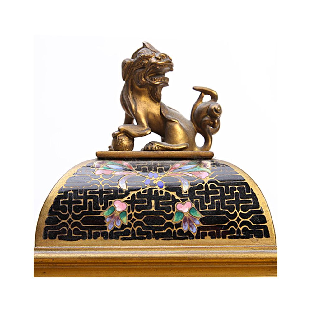 French Bronze Orientalist Mantel Clock Having a Stylized Lion at Top by Bigelow Kennard For Sale