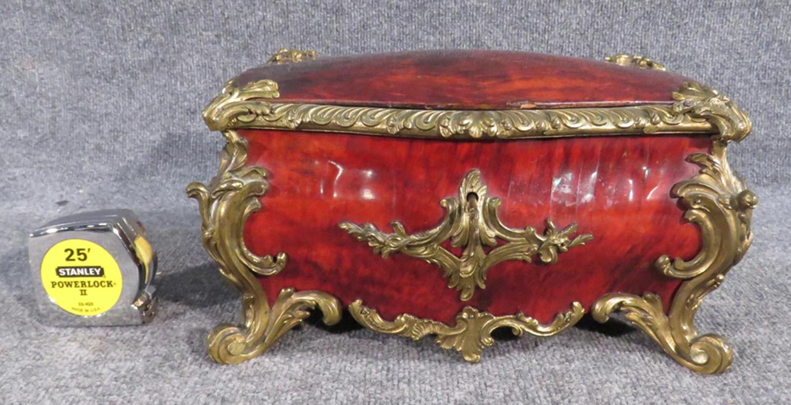 This is a fantastic French jewelry casket with tortoiseshell veneer and while it does have some condition issues as the photos clearly show, the casket is still incredibly beautiful and rich looking. It measures: 8