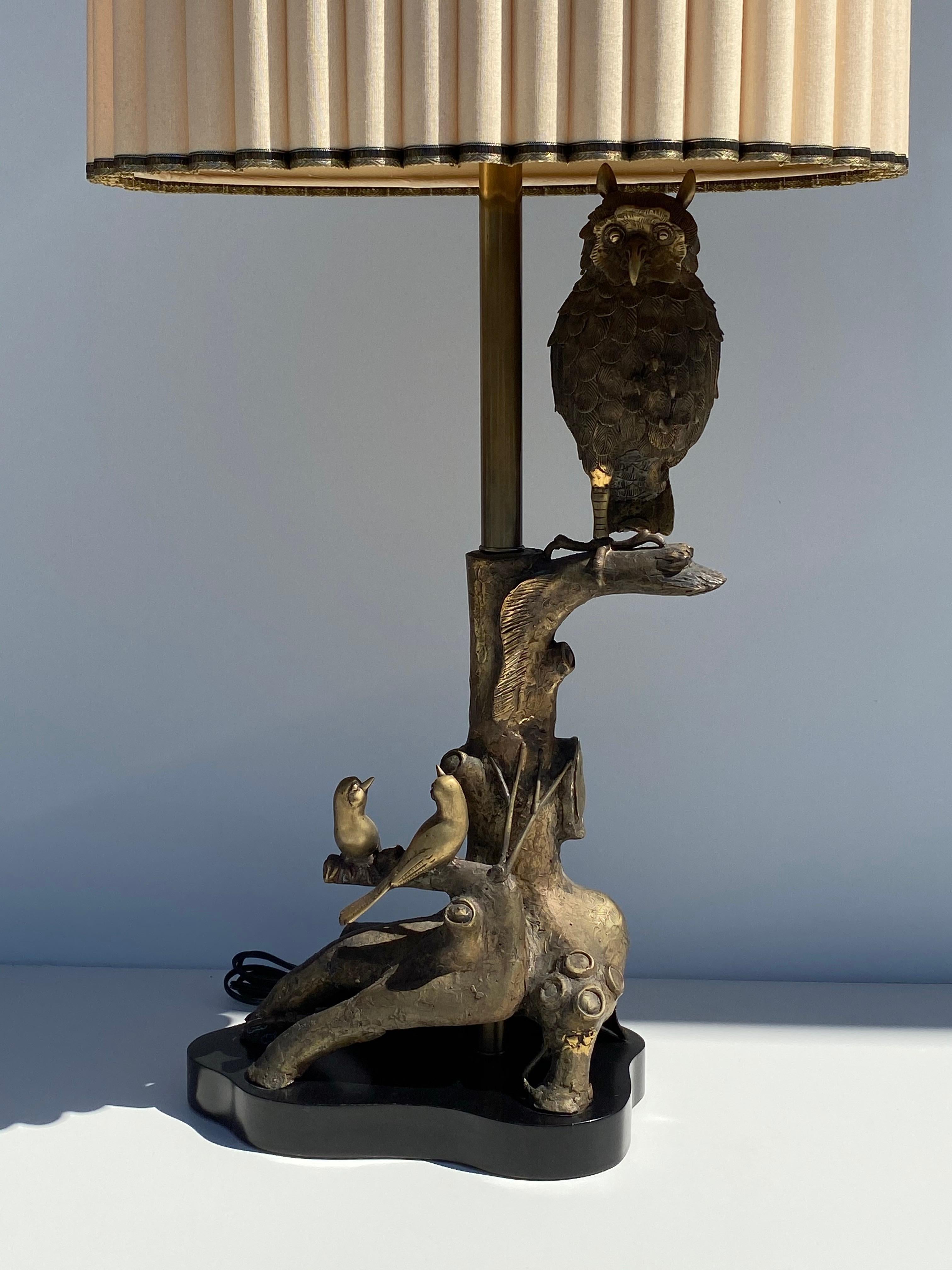Patinated bronze owl lamp by with birds and tree trunk details by Marbro with original shade which is 17