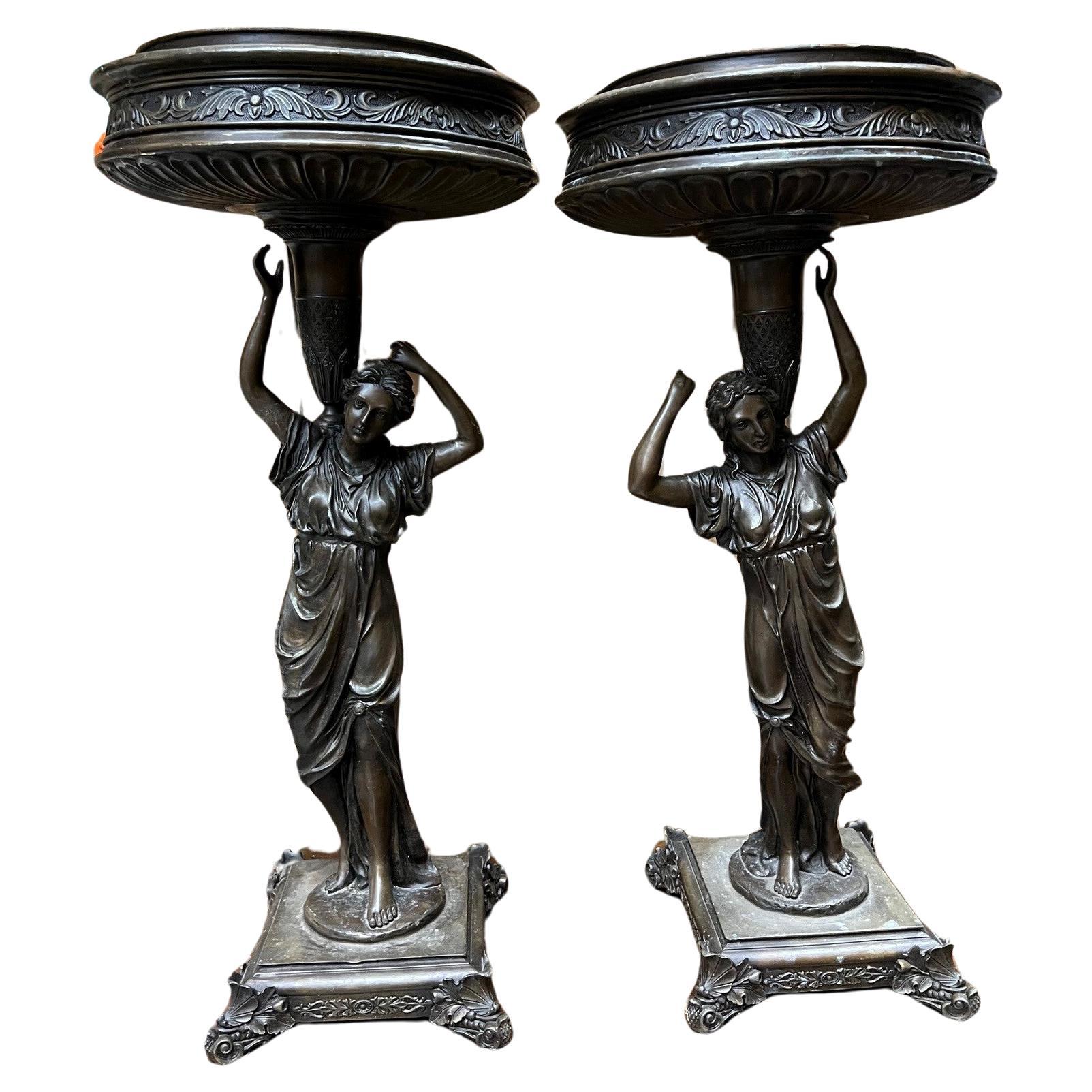 Bronze Pair of Classical Style Pedestal Figural Urns  For Sale