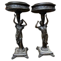 Used Bronze Pair of Classical Style Pedestal Figural Urns 