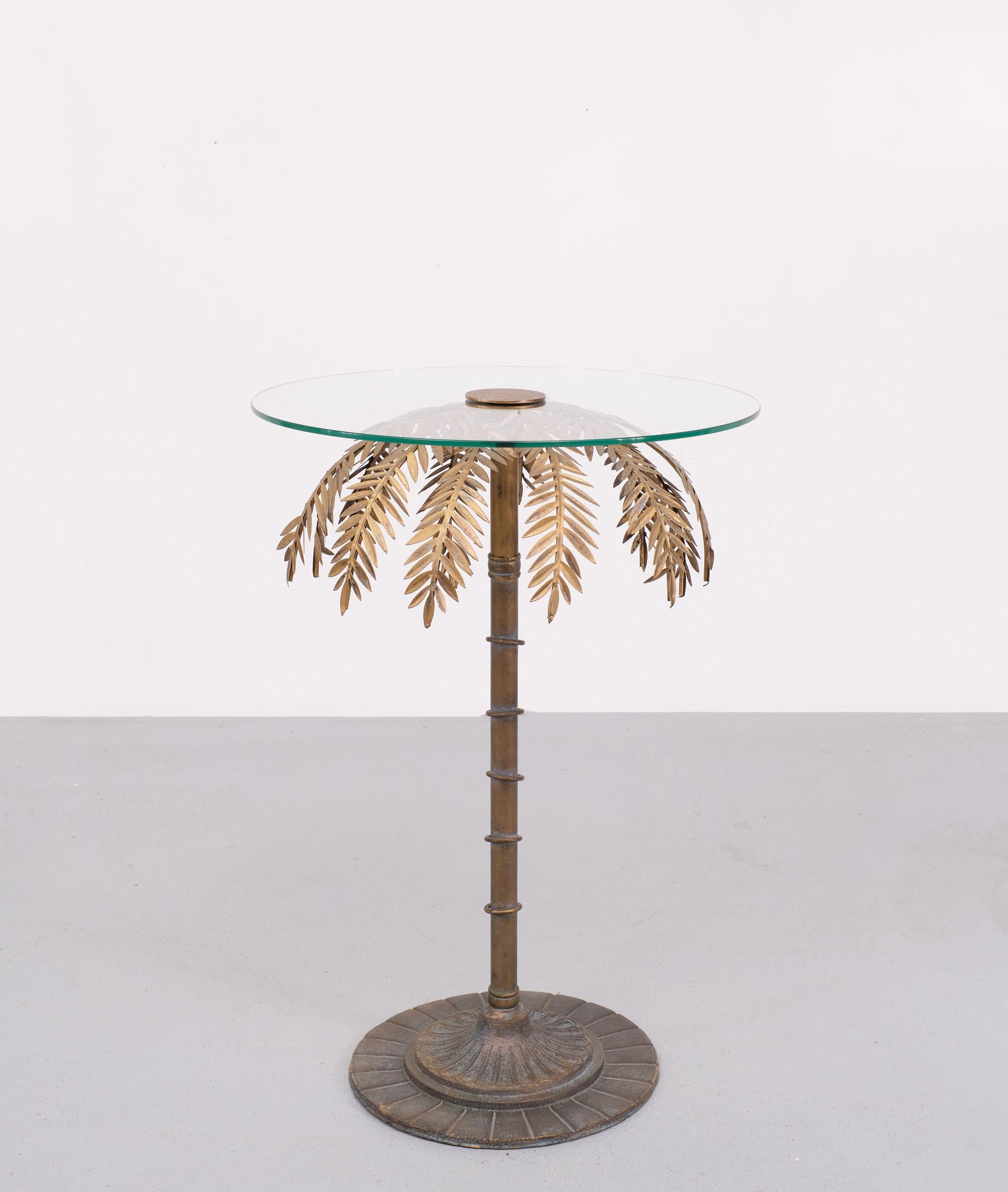 Very nice side table . in the shape of a Palm tree ,comes with a brand new Glass top .
Bronze color , Maison Jansen in style  .

Please don't hesitate to reach out for alternative shipping quote