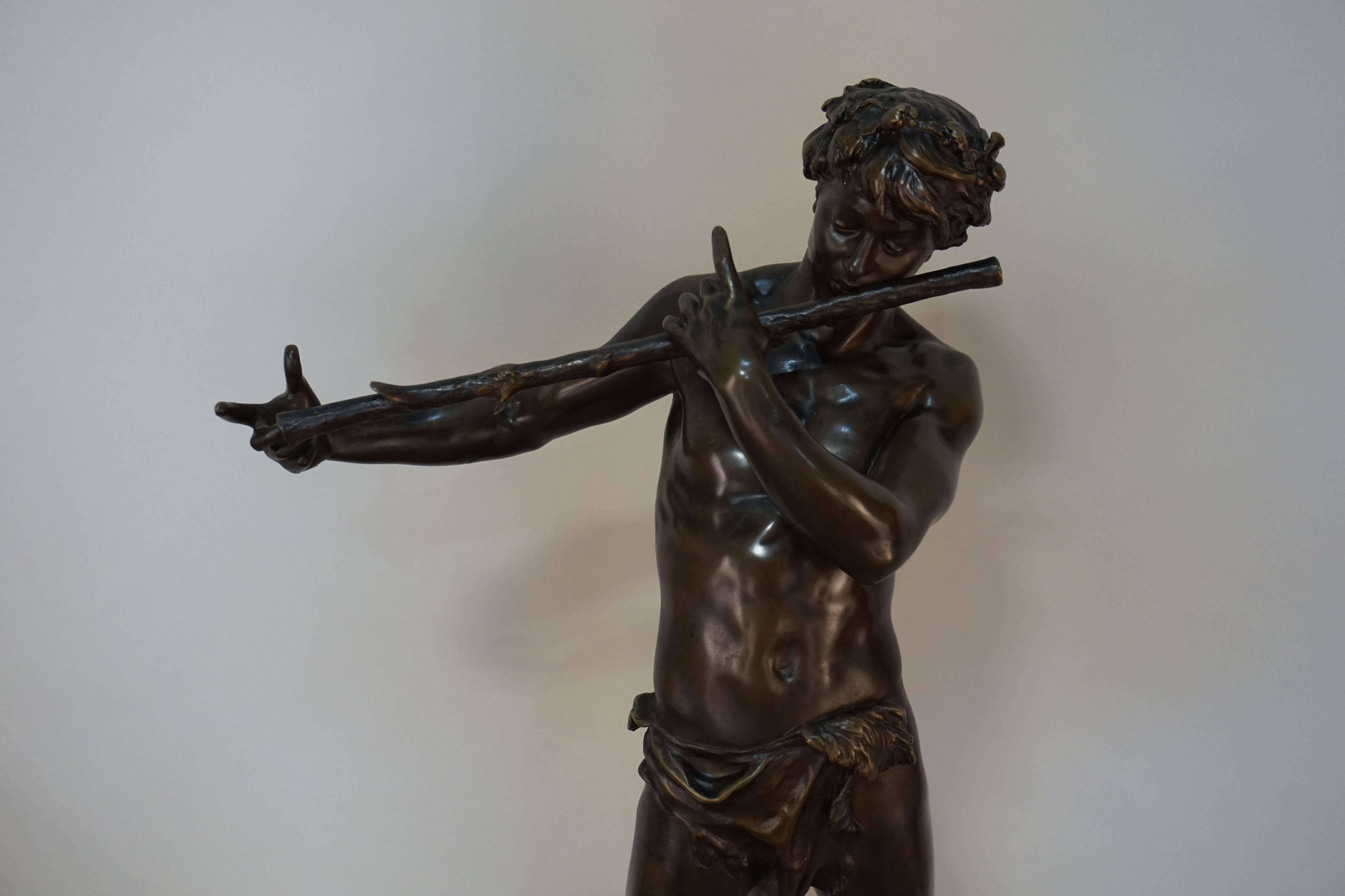 An exceptional early 20th century bronze, pan playing flute by Felix Maurice Charpentier (1858-1924).