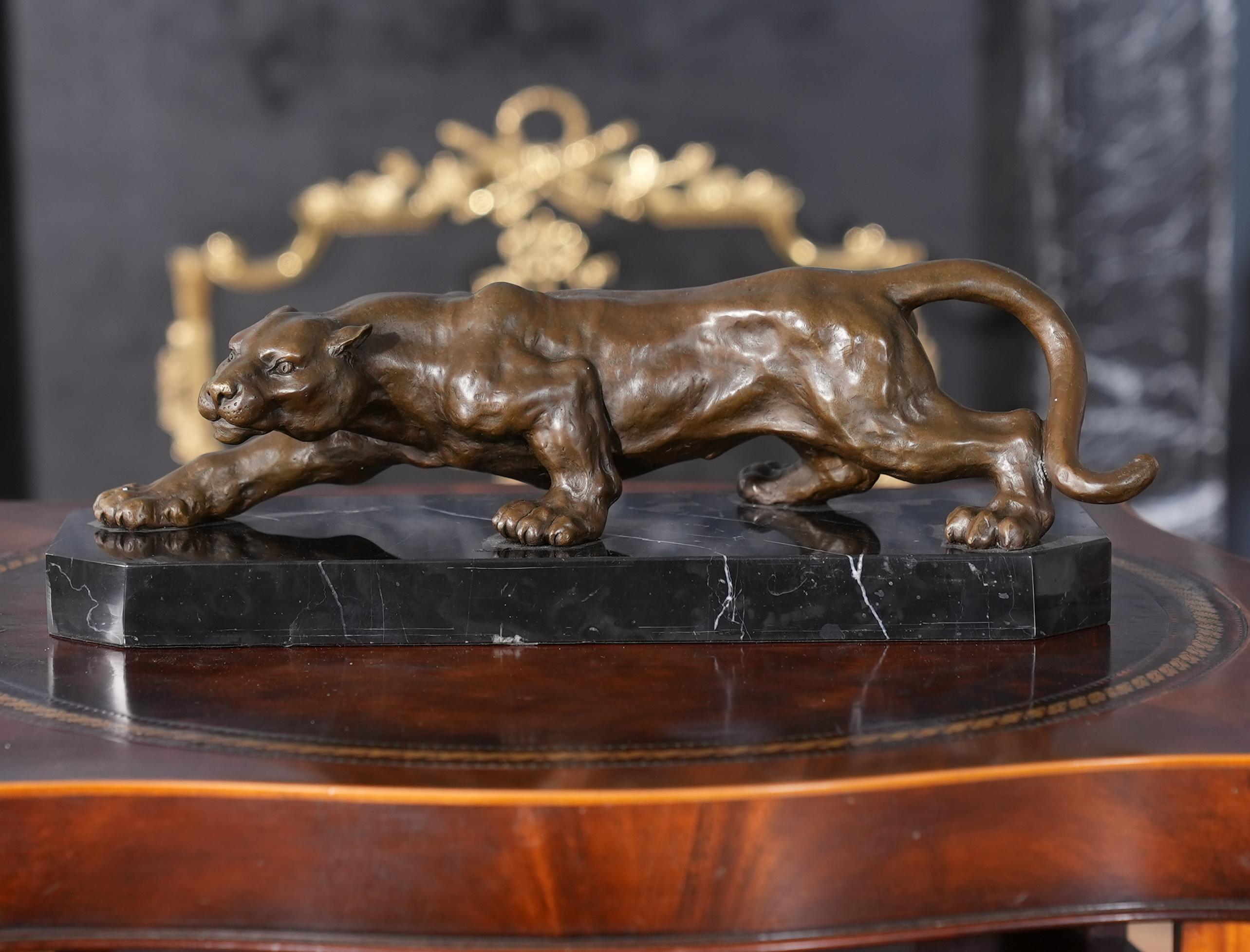 Graceful even when standing still the Bronze Panther on Marble Base is a striking addition to any setting. Using traditional lost wax casting methods the Bronze Panther is created in pieces and then joined together with brazing and hand chaised