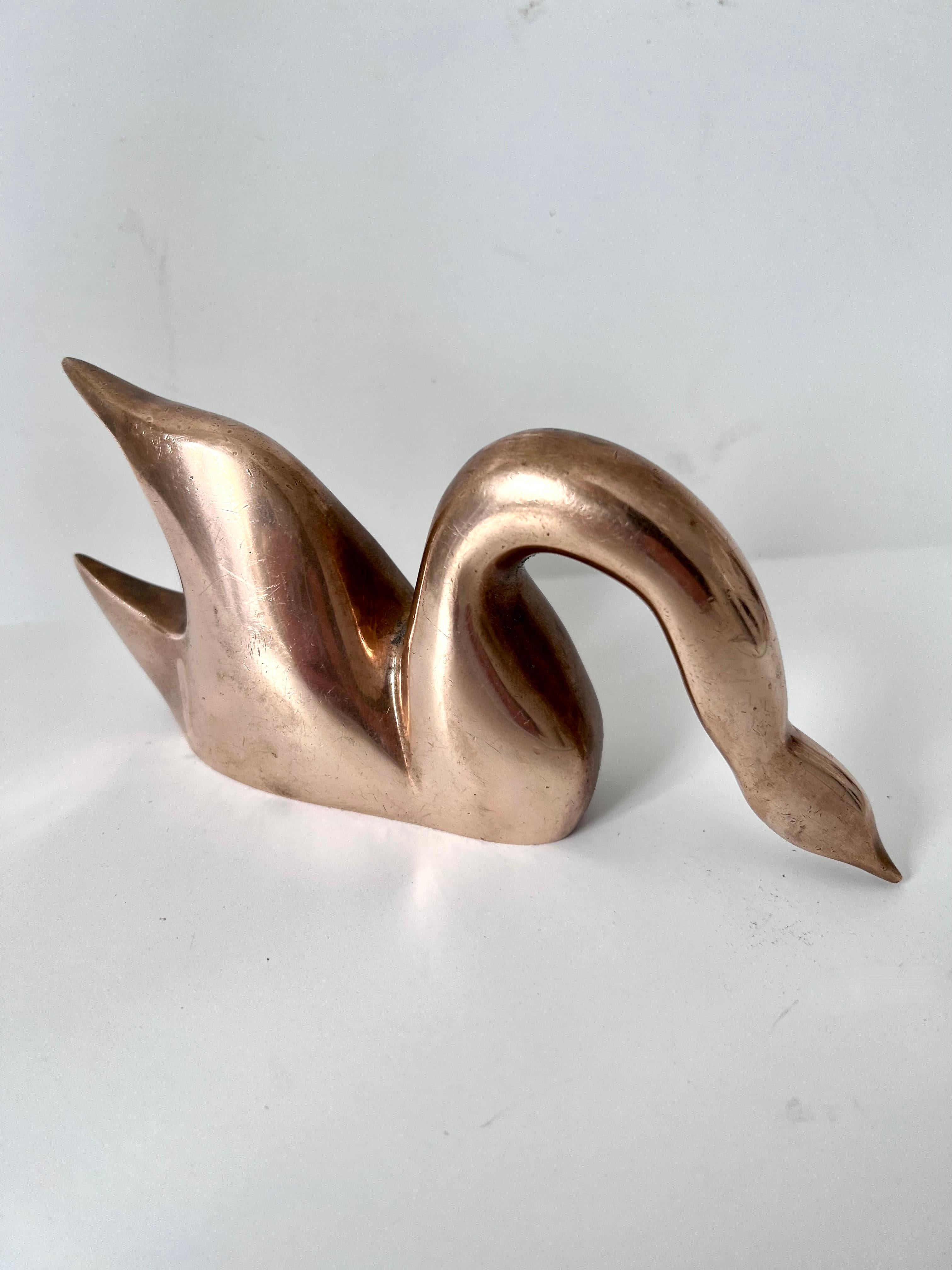 Acquired in Paris, France, a beautifully designed and sculpted bronze figure of a bird. A wonderful paperweight or stand alone sculpture. A compliment to any shelf or work station.