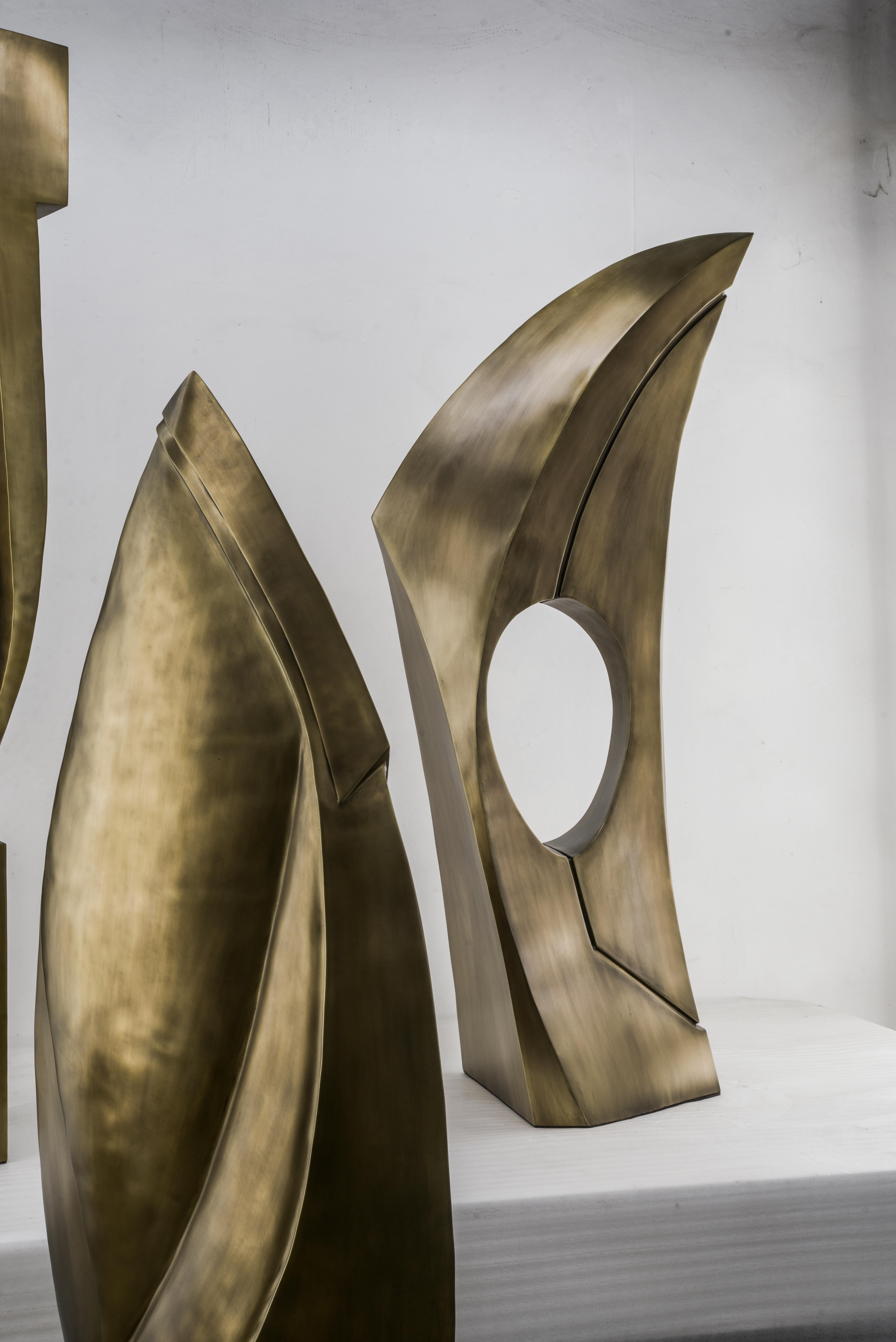 Patrick Coard Paris expands on his unique and beautiful sculptural object collection. The Golden ratio is a powerful piece evoking the essence of strength, perfection and beauty. The piece is entirely handcrafted in bronze-patina brass. See images