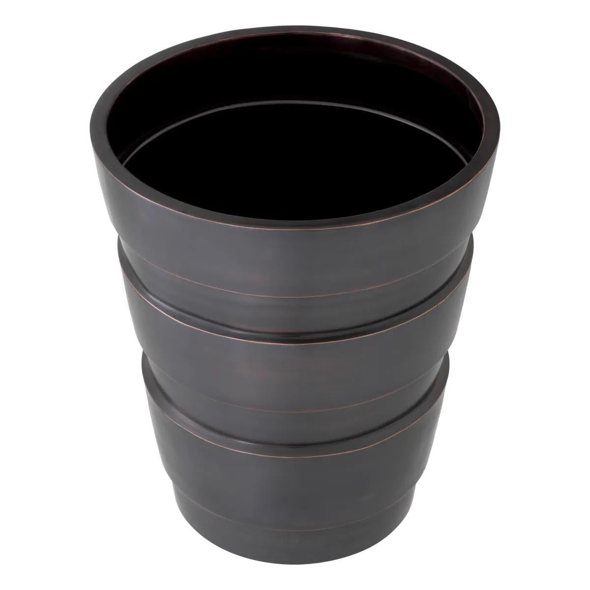 Bronze patinated metal planter, modern indoor planter.

Enhance the atmosphere of your home with this planter by creating a beautiful arrangement of plants or flowers.
With its clean and simple design, this planter features a beautiful bronze