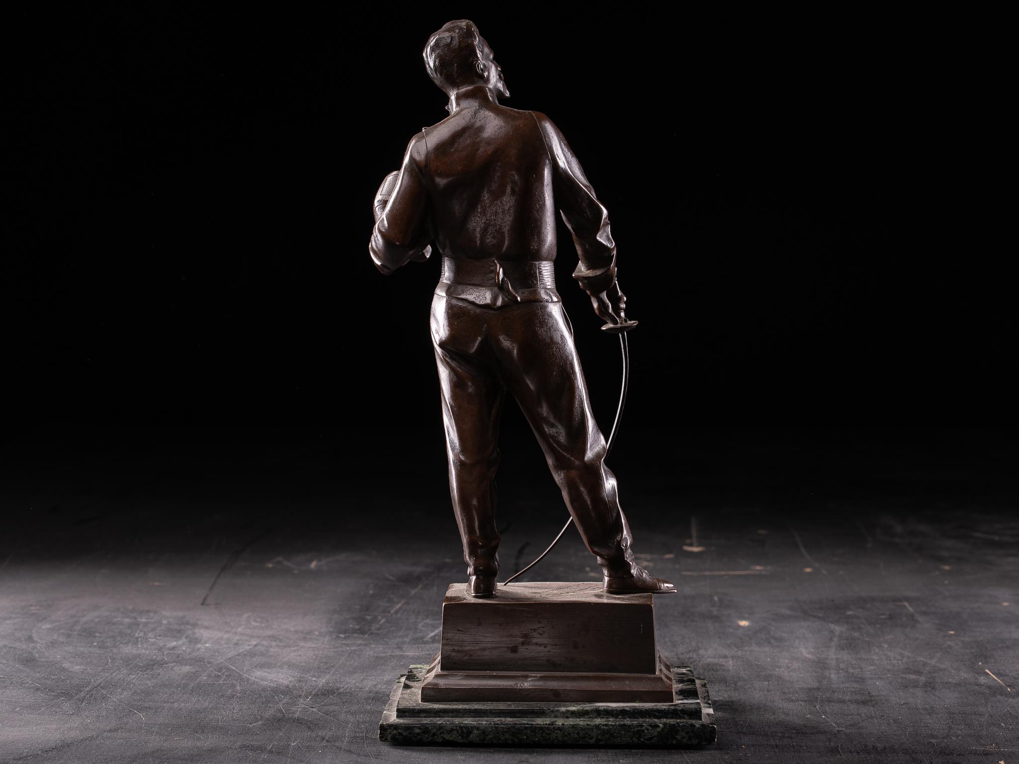 XX secolo Bronze patinated Statue of Fencer by G.Devreese (1861-1941) . in vendita