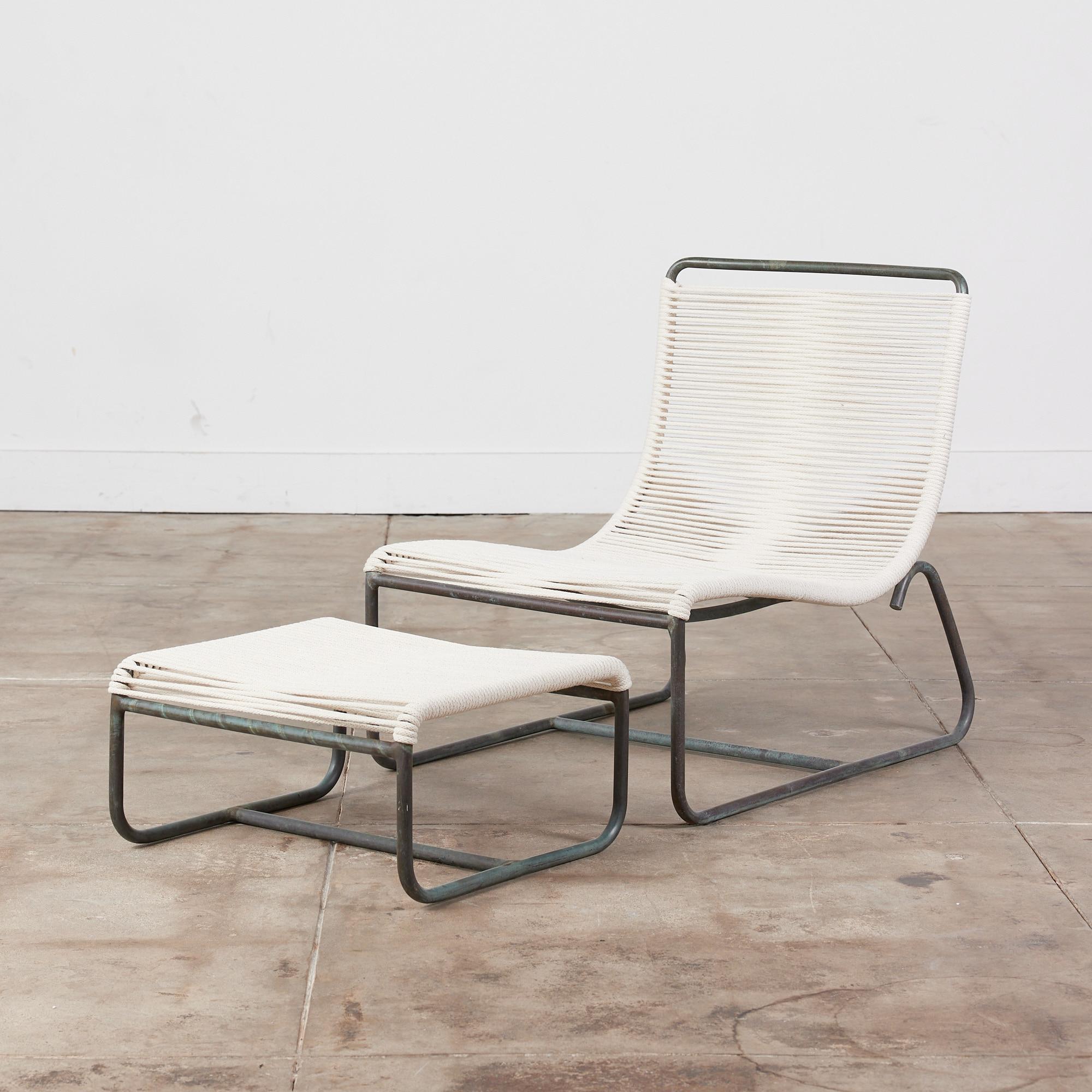A low lounge chair, known as the “Sleigh Chair,” by Walter Lamb for Brown Jordan. The chair comes with an ottoman that slides beneath the chair seat for easy storage. A continuous length of tubular bronze serves as the frame of a scooped seat, bends