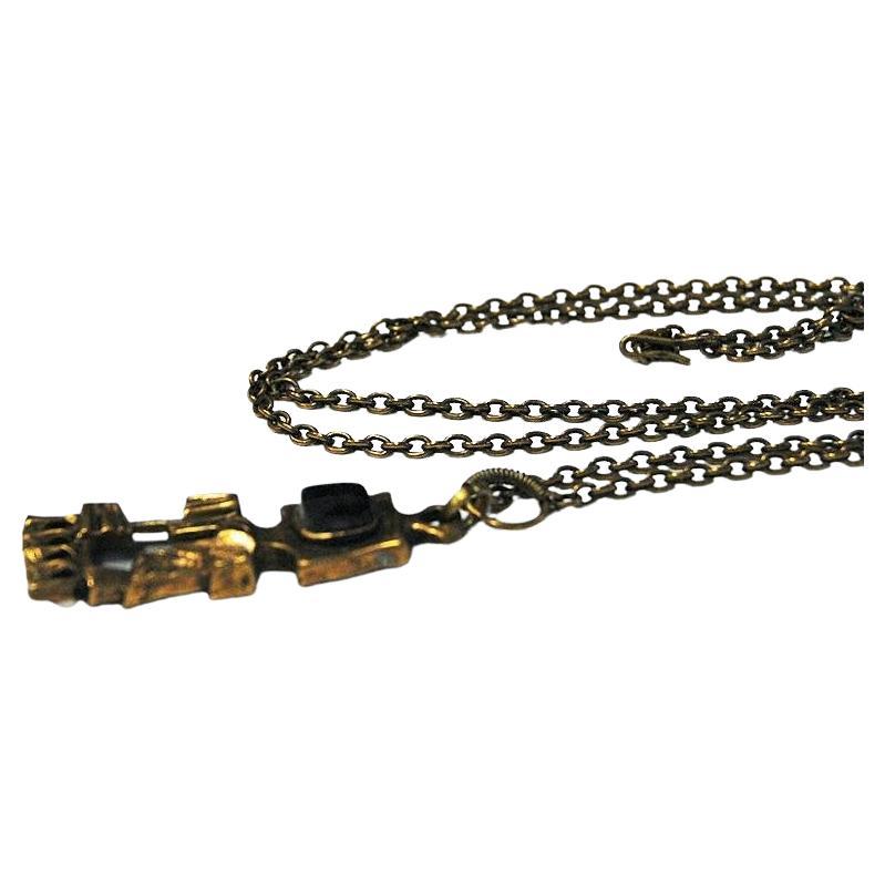 gold lego necklace