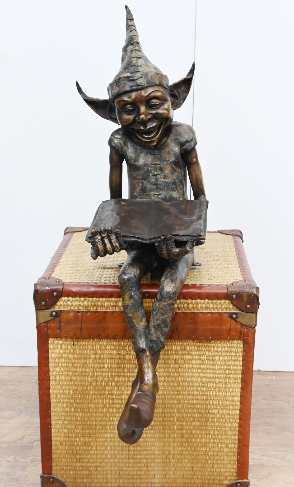 Quirky and characterful bronze pixie - or fairey - shown reading a book
We believe he is reading the elph and safety manual to avoid further workplace bad jokes
Just look at the patina to the bronze with verdis gris finish
Seated statue so can sit