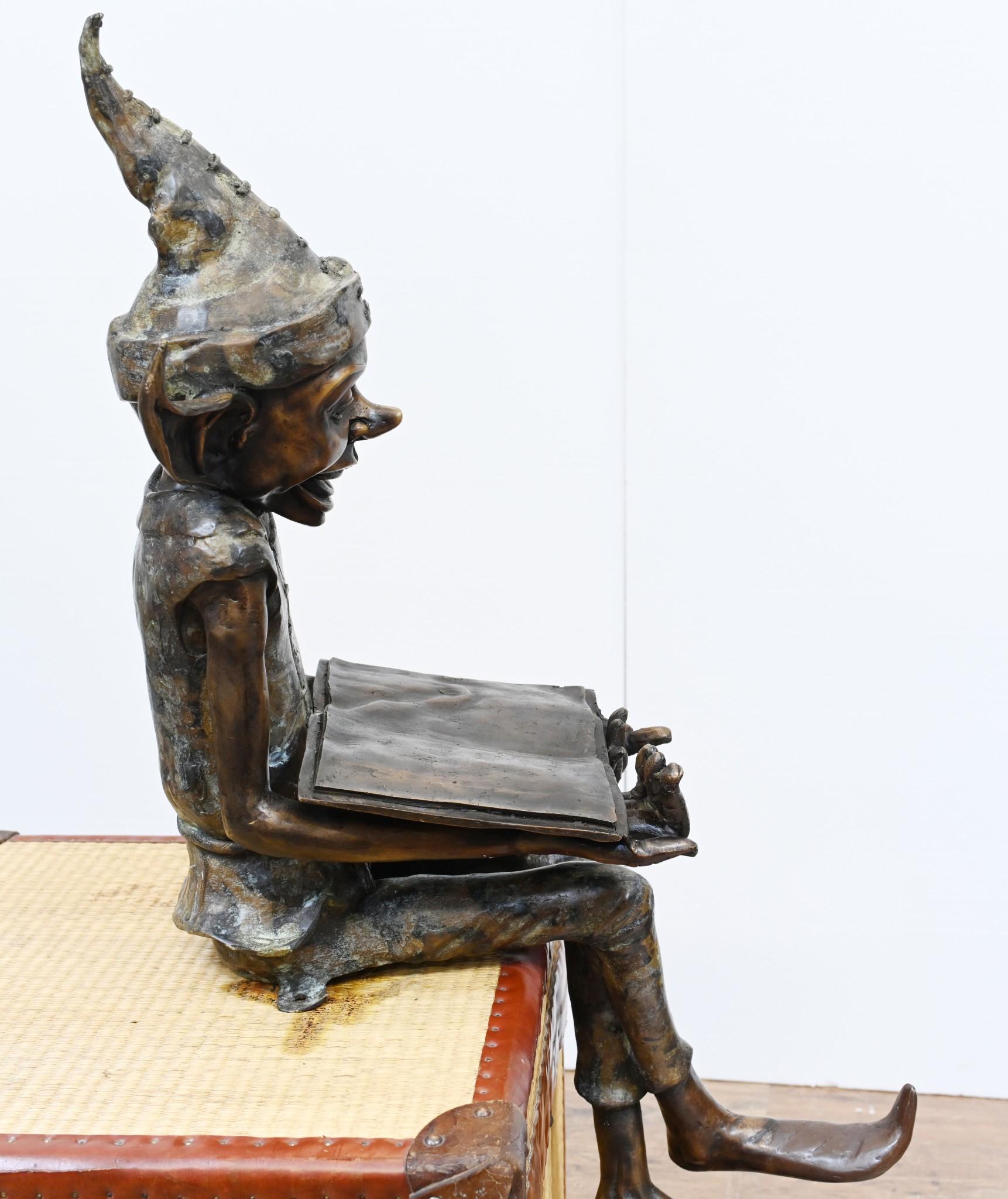 Late 20th Century Bronze Pixie Fairey Statue Reading Elph and Safety Manual For Sale