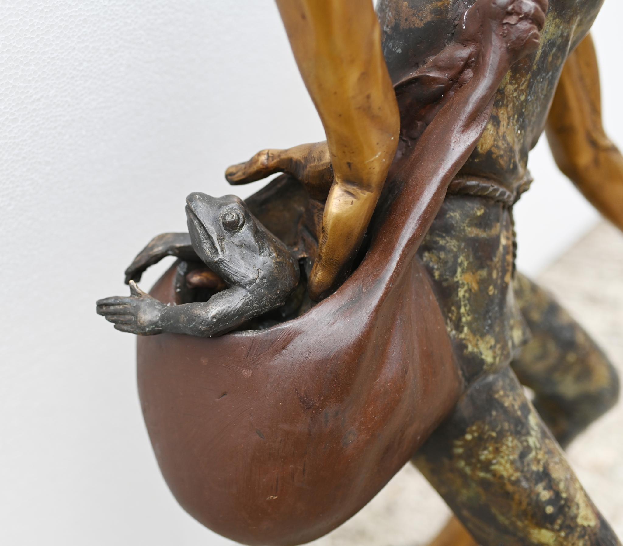 A wonderful study of a pixie going about his duties as a toad catcher
Retaining its original patina standing on an integral base
Ideal for placing around your pond
Good size at four feet tall - 122 CM
Holds one toad in his hand whilst the toad bag