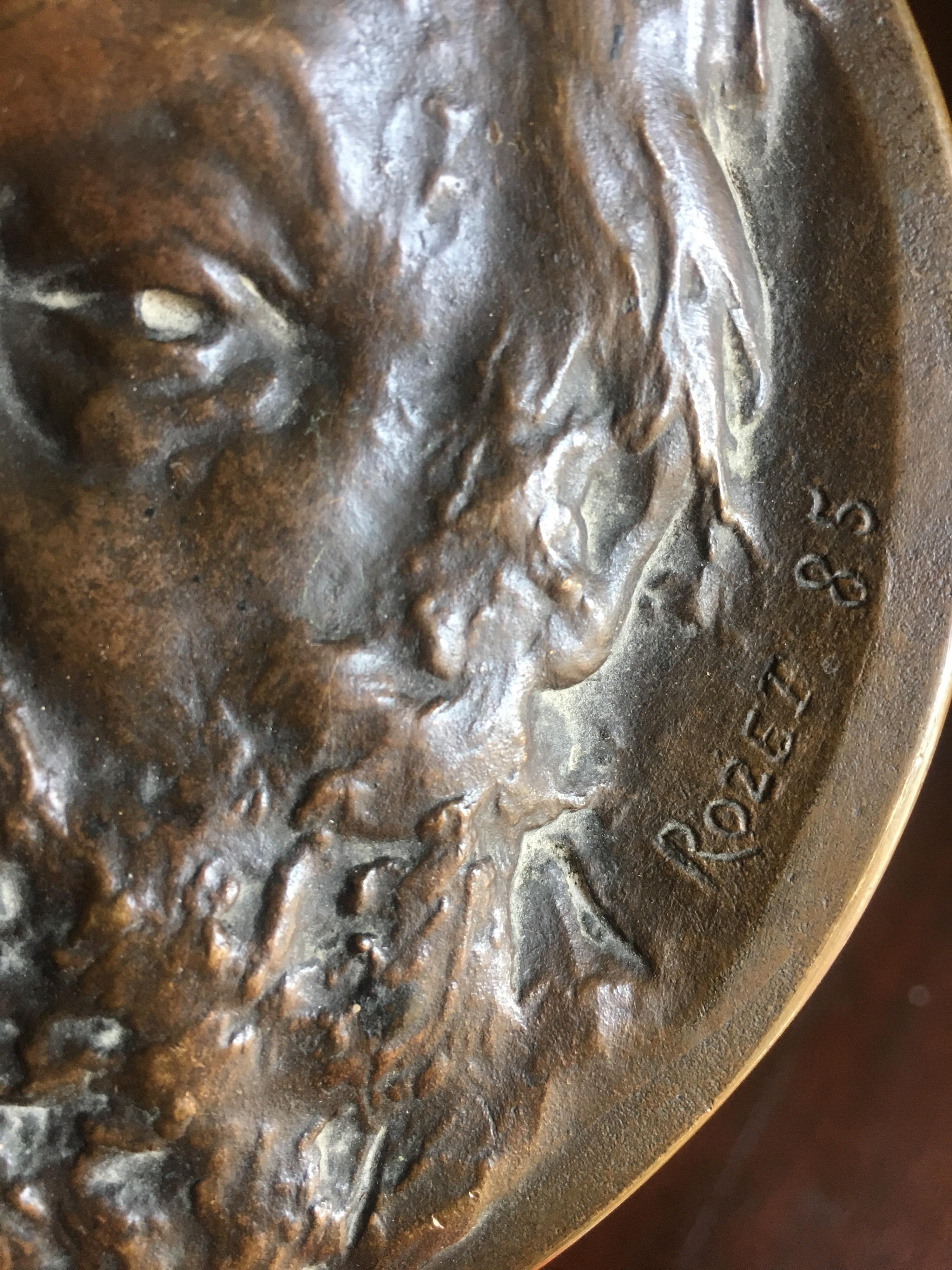 Medallion engraved by Rene Rozet, student of Cavelier, for the centenary of Victor Hugo. The relief portrait has beautiful slightly red patina.
 