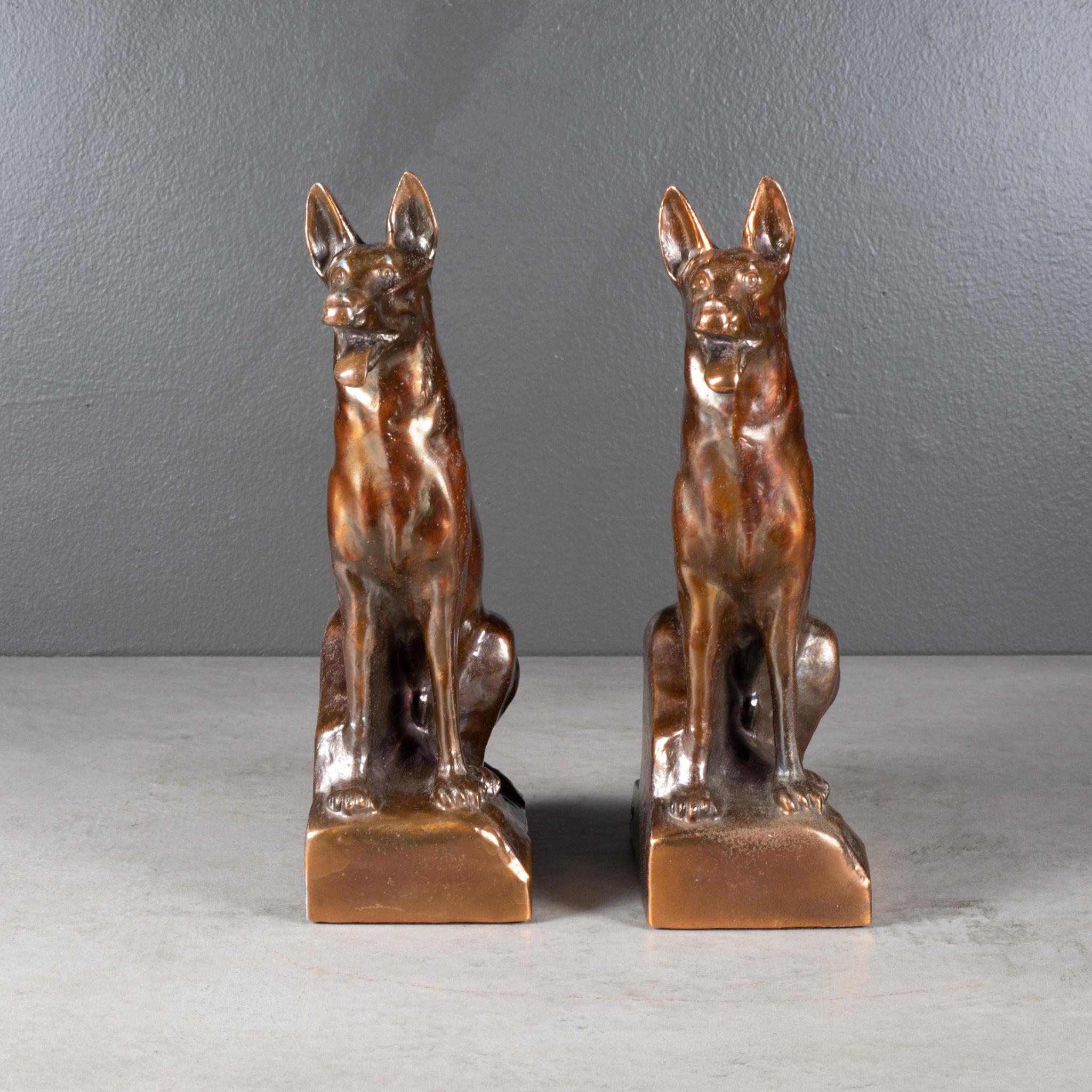 ABOUT

A pair of large bronze plated German Shepherd bookends with original felt on the bottom. Both stamped 