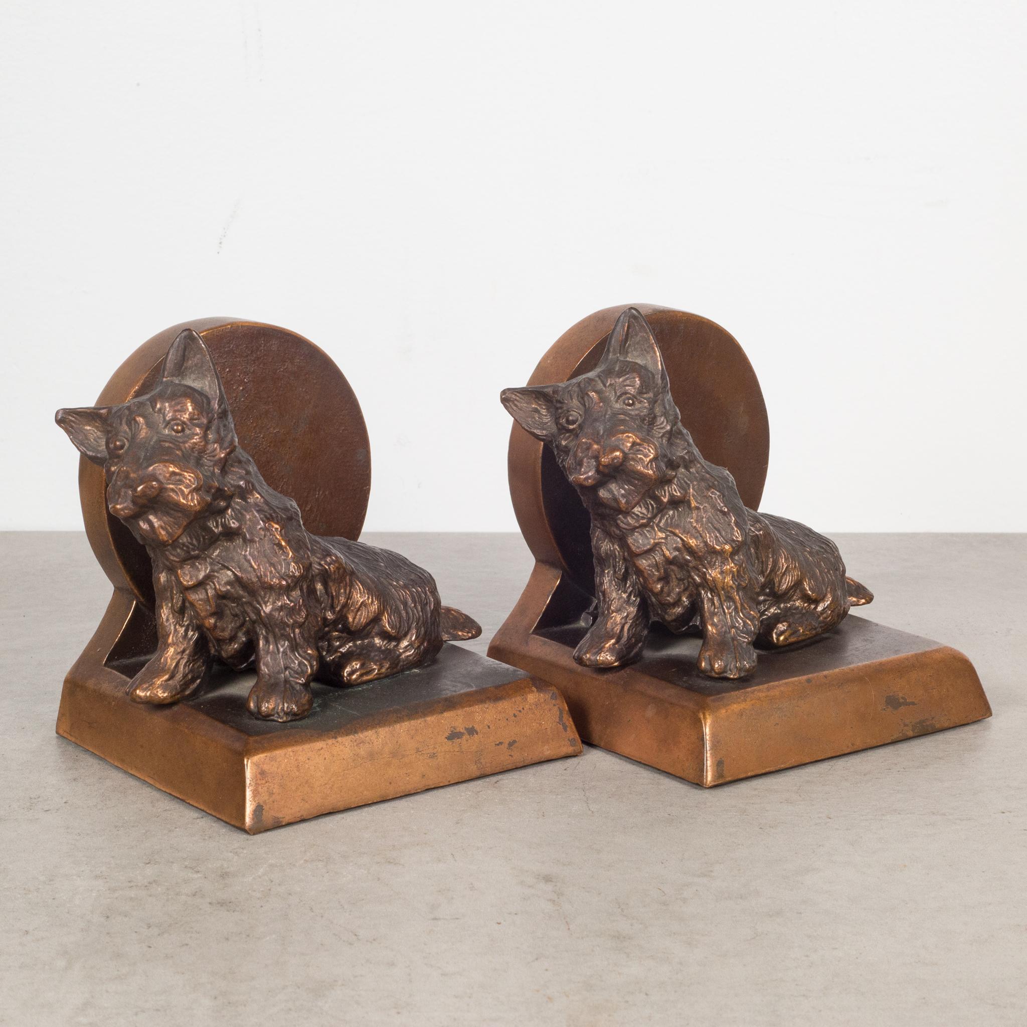 About

A vintage pair of bronze plated Scotty Dog bookends on pedestals with original felt.

Creator Unknown.
Date of manufacture c.1940s.
Materials and techniques bronze plate, felt.
Condition good. Wear consistent with age and