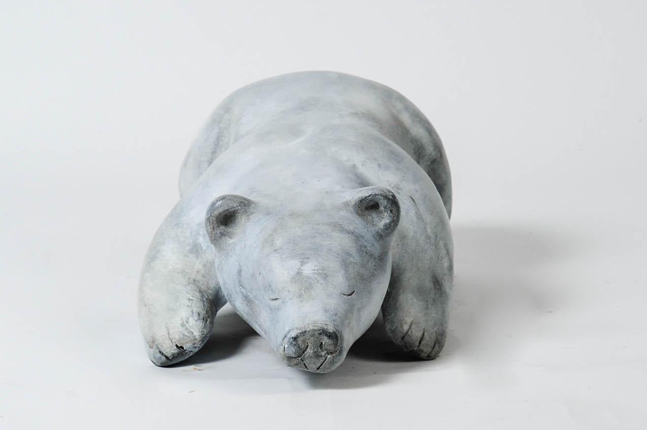 Solid bronze polar bear with white patina 
Signed but unreadeble.
