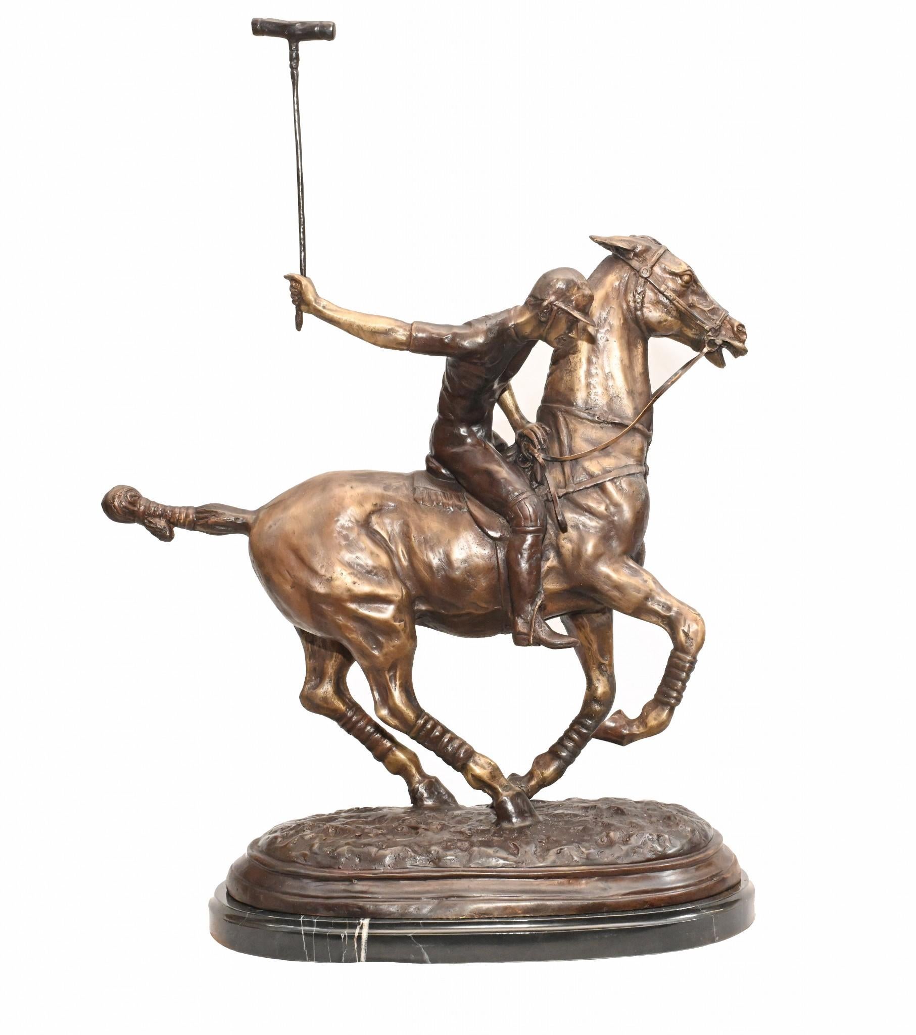 Stunning English bronze casting of a polo player in full swing
Artist has really captured the energy and athleticism of the scene with great skill
Patina to the bronze is superb with various brown hues
Piece sits on a black marble base which is